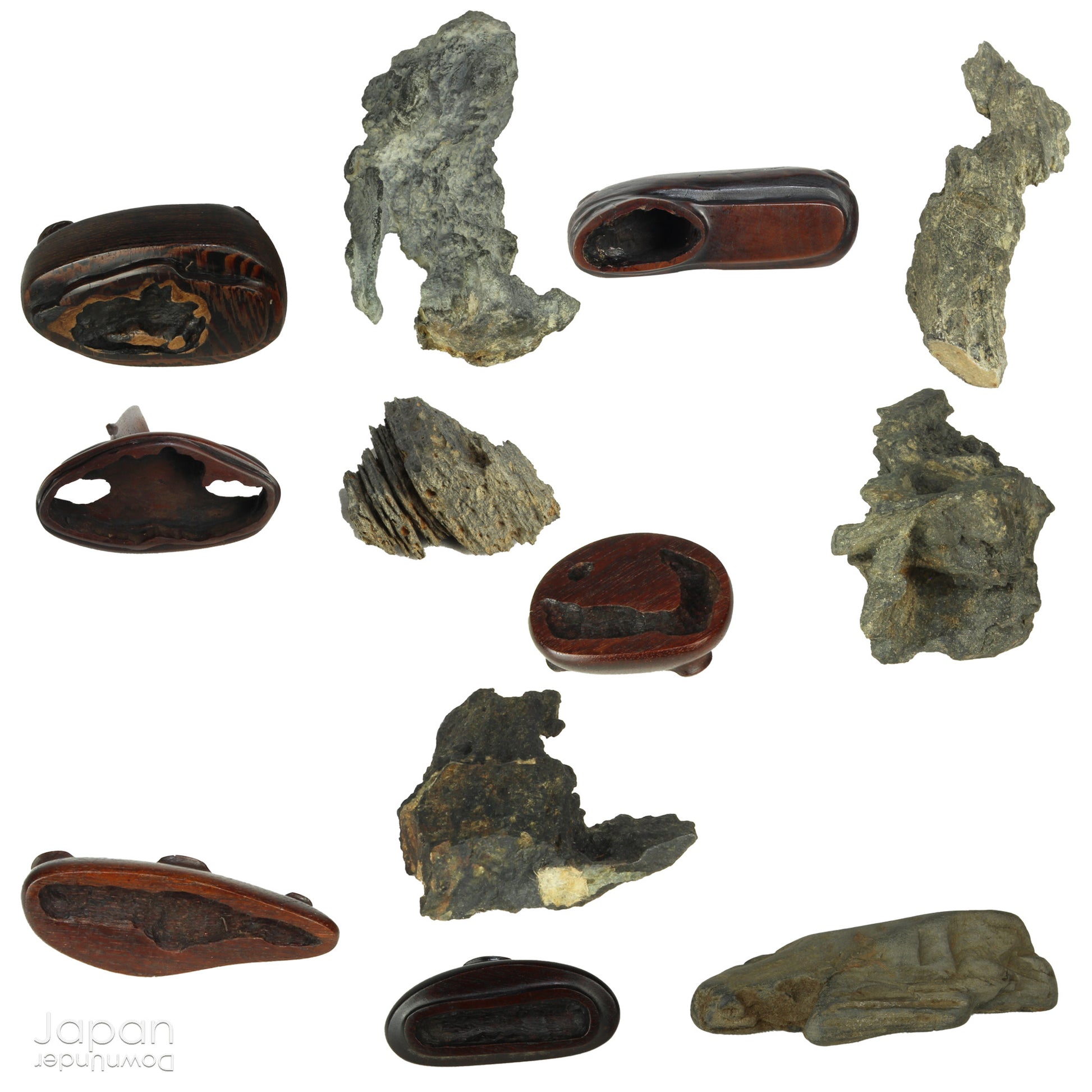 Invite serenity and understated beauty into your space with this remarkable collection of seven vintage miniature Japanese suiseki - natural “water stones” cherished for their quiet symbolism and evocative forms. Each small stone rests atop a finely hand-carved ebony daiza (stand), thoughtfully crafted to support and elevate its unique presence.