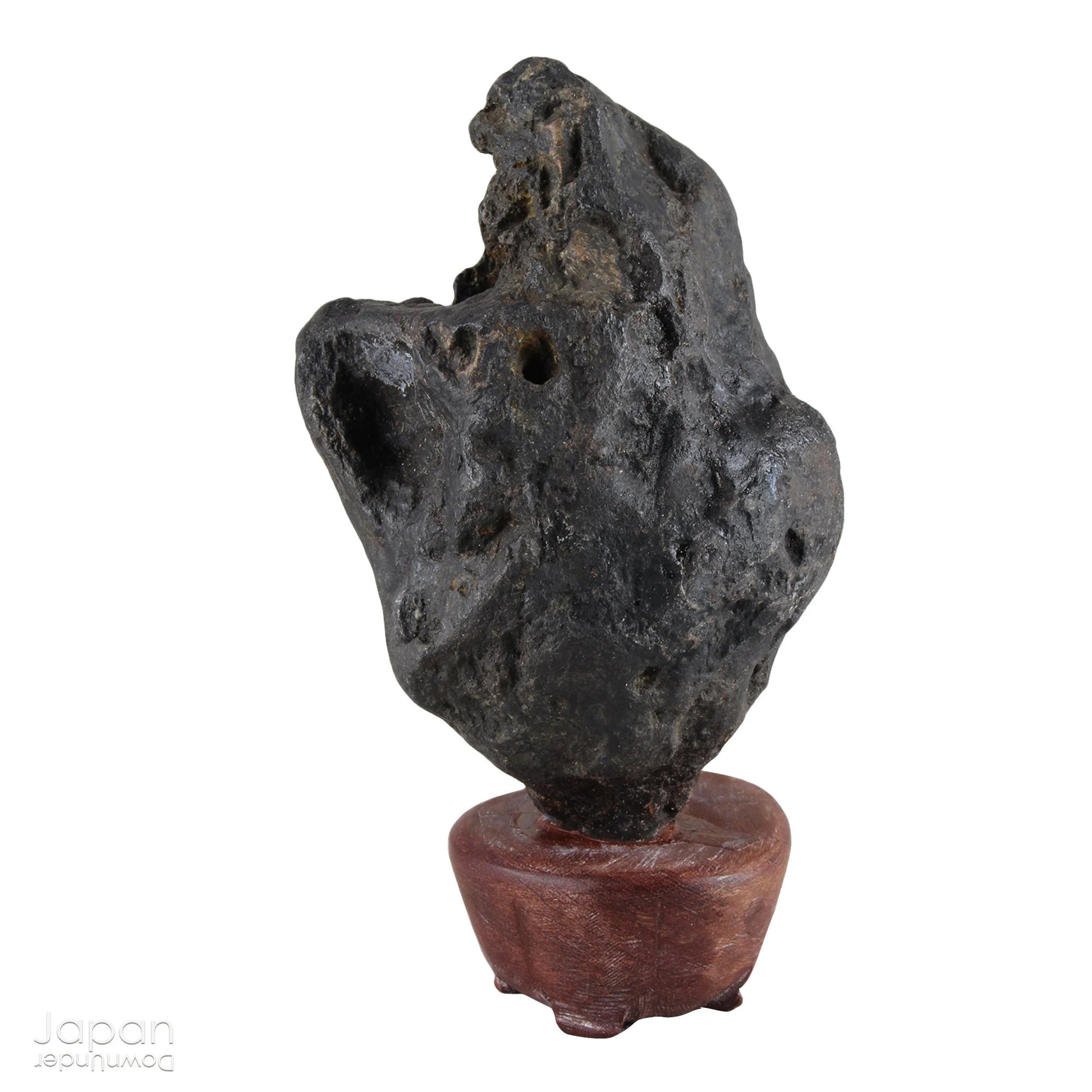 Gracefully poised atop a hand-carved wooden daiza (stand), this suiseki stone emanates a quiet, contemplative energy - making it an ideal centerpiece for spaces devoted to mindfulness, reflection, or artistic inspiration.
