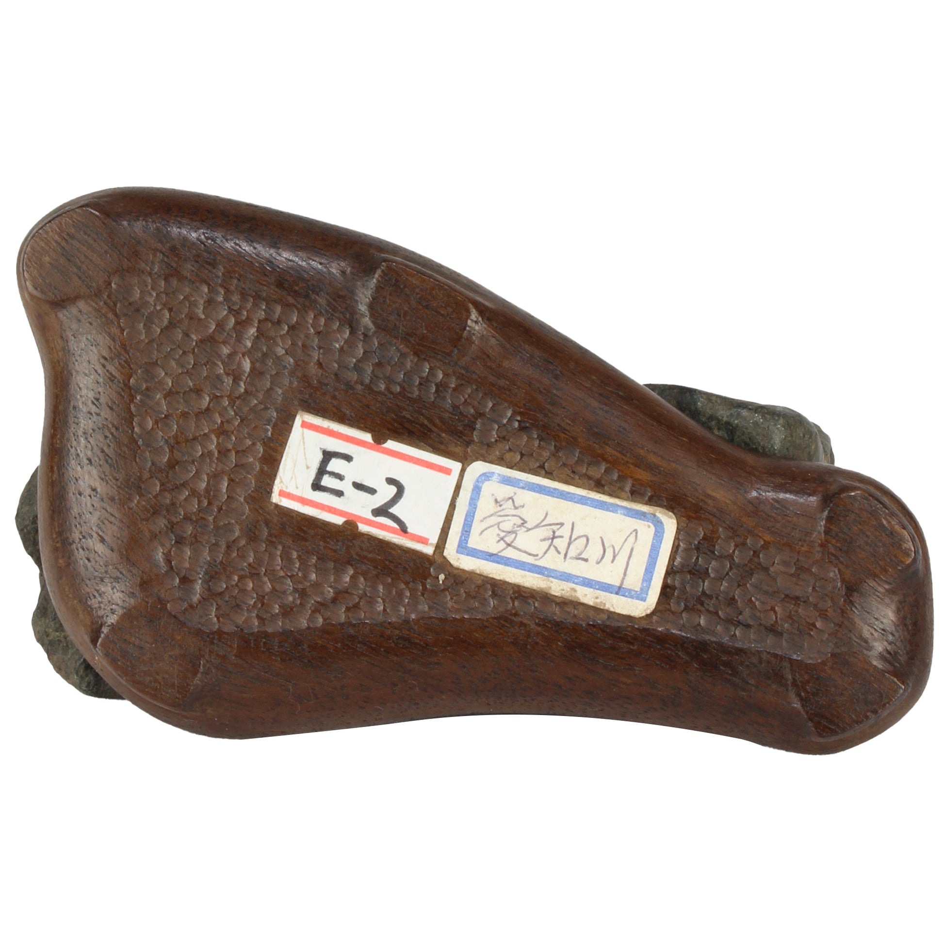 This vintage Japanese suiseki offers a quiet meditation on nature’s artistry ;a naturally weathered stone that embodies stillness, grace, and introspection. Resting atop an intricately hand-carved daiza, it invites the viewer into a space of reflection and reverence, where simplicity holds profound depth.