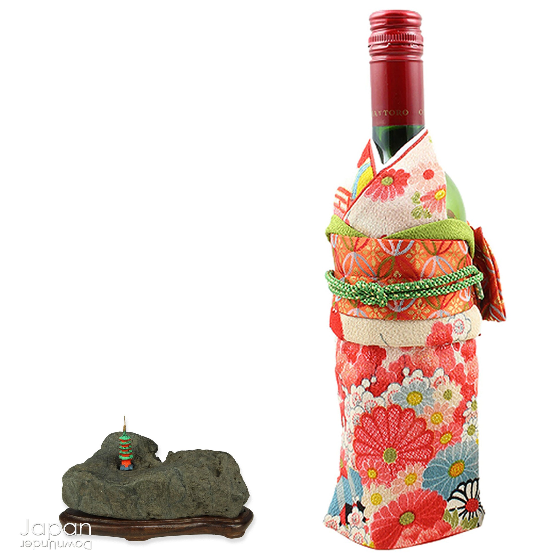 This vintage Japanese suiseki offers a quiet meditation on nature’s artistry ;a naturally weathered stone that embodies stillness, grace, and introspection. Resting atop an intricately hand-carved daiza, it invites the viewer into a space of reflection and reverence, where simplicity holds profound depth.