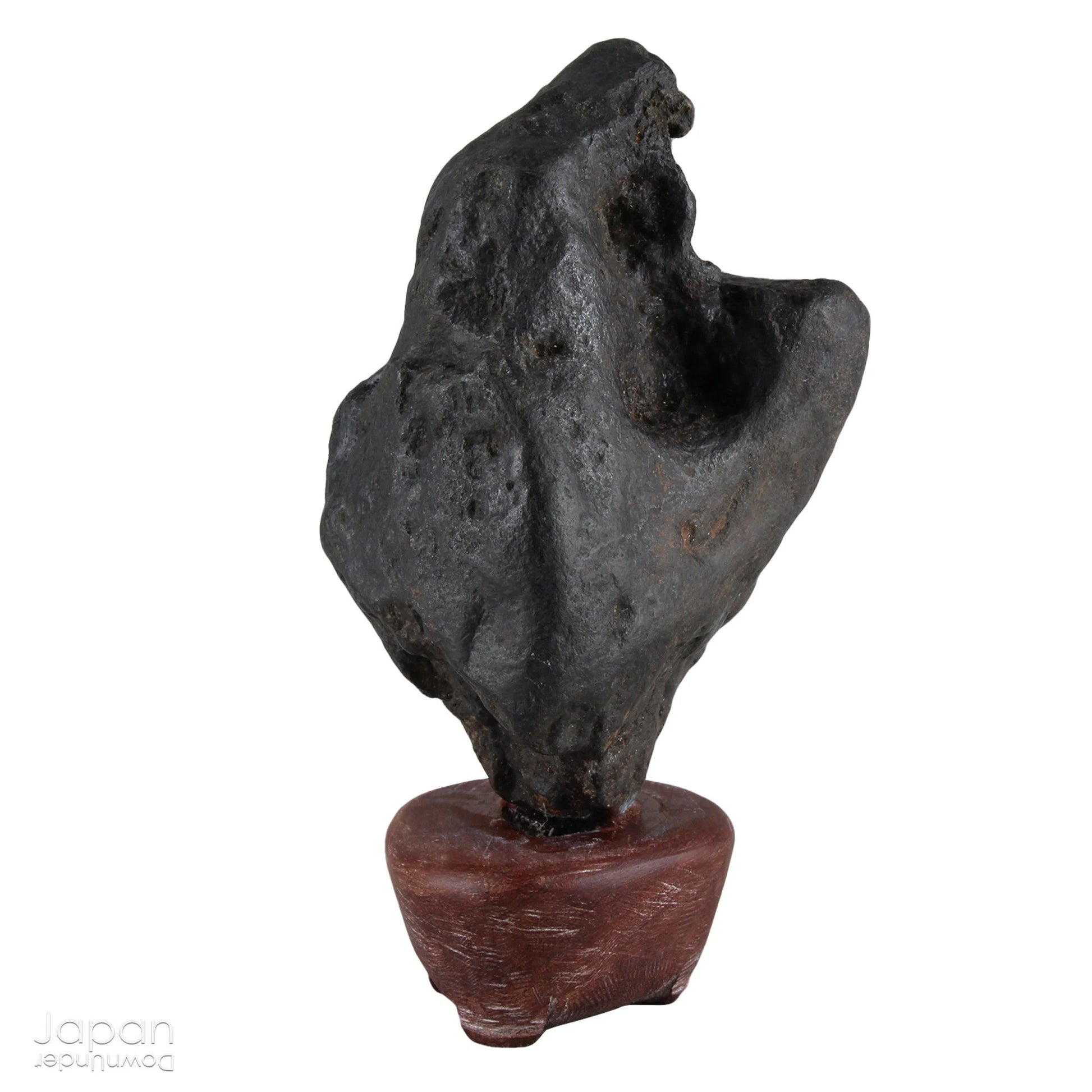 Gracefully poised atop a hand-carved wooden daiza (stand), this suiseki stone emanates a quiet, contemplative energy - making it an ideal centerpiece for spaces devoted to mindfulness, reflection, or artistic inspiration.