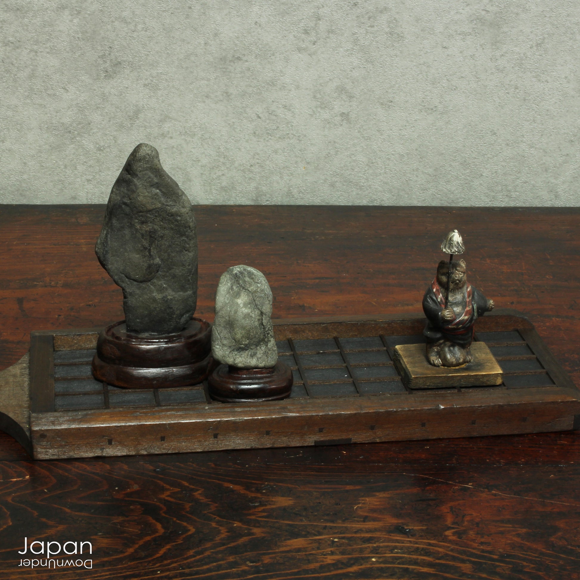 Invite a sense of contemplative calm into your space with this evocative pair of vintage Japanese suiseki - natural stones shaped by the slow, patient hands of time. Rooted in the Japanese aesthetic traditions of wabi-sabi and the reverence for impermanence, these stones are more than mere objects; they are landscapes in miniature, vessels of stillness, and silent poems composed by nature itself.