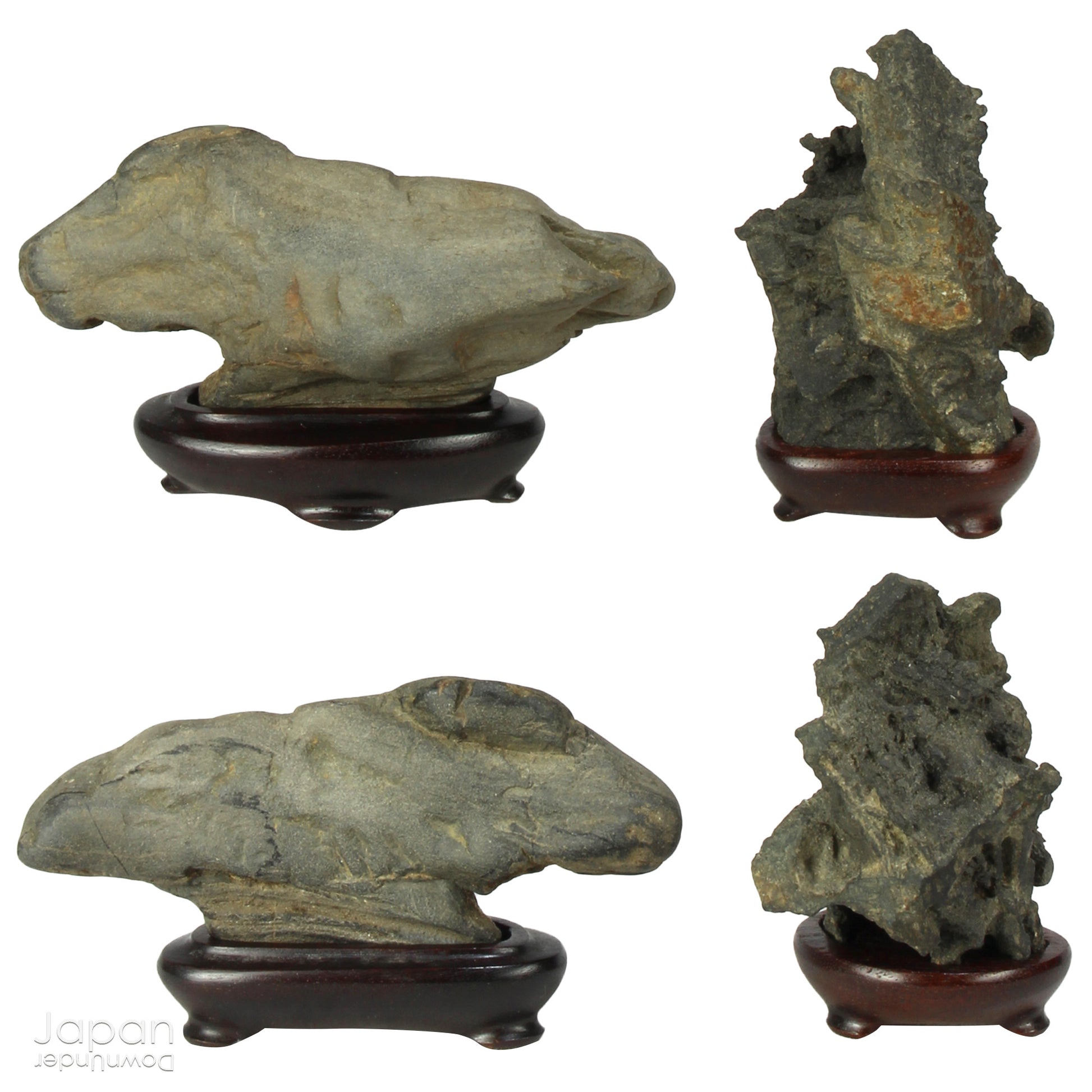 Invite serenity and understated beauty into your space with this remarkable collection of seven vintage miniature Japanese suiseki - natural “water stones” cherished for their quiet symbolism and evocative forms. Each small stone rests atop a finely hand-carved ebony daiza (stand), thoughtfully crafted to support and elevate its unique presence.