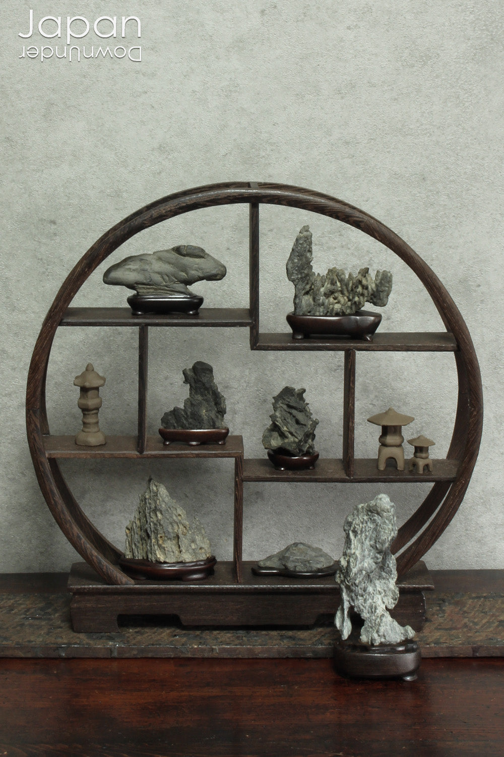Bring quiet elegance and visual harmony to your space with this handcrafted display shelf - an ideal stage for suiseki stones, miniature treasures, teapots, or beloved keepsakes. More than just storage, this piece turns your collection into a thoughtful and serene focal point.