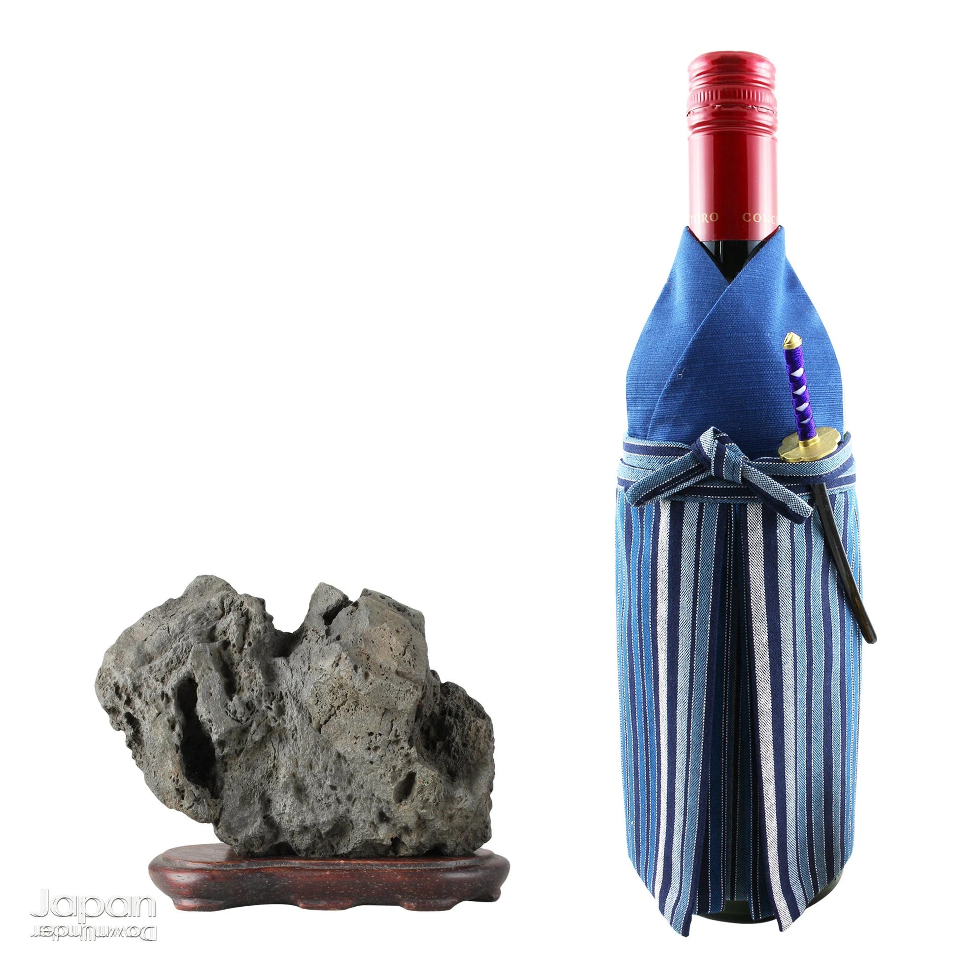 Infuse your interior with the quiet power of nature through this evocative vintage Japanese suiseki. Cradled on a finely hand-carved wooden daiza (stand), this stone exudes a meditative stillness - an ideal focal point for spaces designed for reflection, mindfulness, or artistic appreciation.