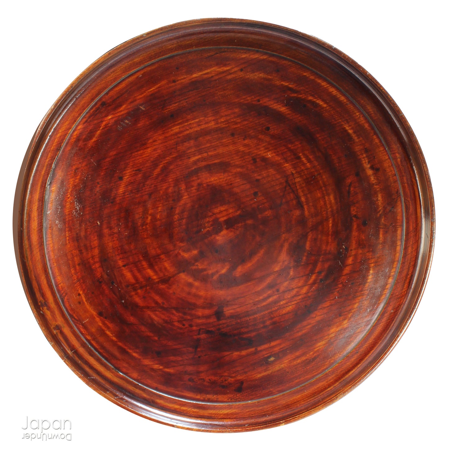 Add timeless charm and rustic elegance to your home with this exceptionally large antique round tea tray, hand-carved from a single cross-section of zelkova (keyaki) wood. A beautiful marriage of form and function, this piece serves equally well as a statement display stand, a unique tabletop, or a traditional tea-serving tray.