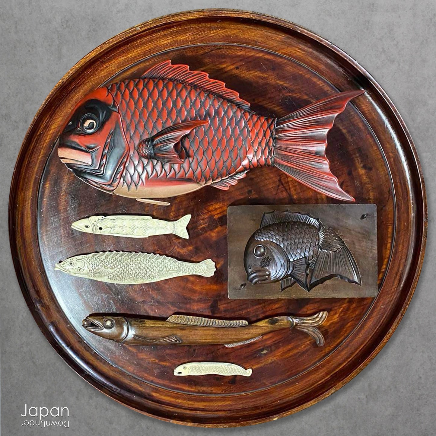 Add timeless charm and rustic elegance to your home with this exceptionally large antique round tea tray, hand-carved from a single cross-section of zelkova (keyaki) wood. A beautiful marriage of form and function, this piece serves equally well as a statement display stand, a unique tabletop, or a traditional tea-serving tray.