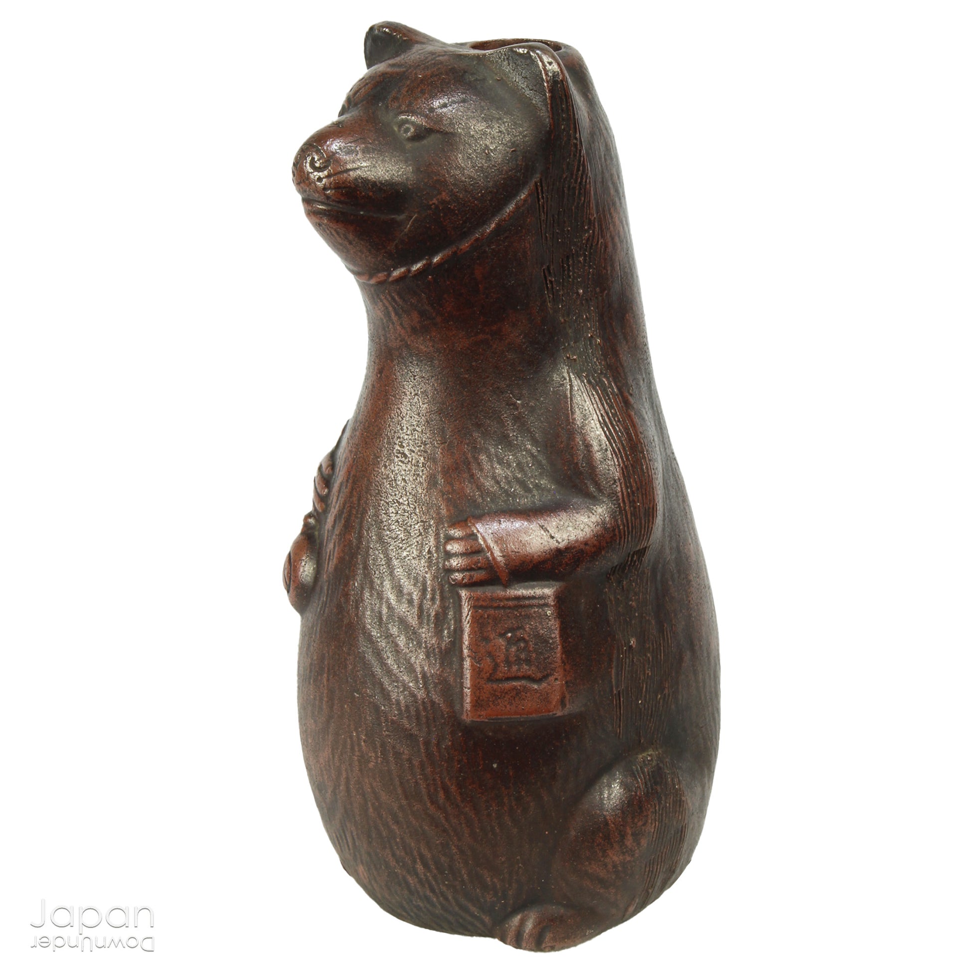 Infuse your space with the timeless elegance of Japanese craftsmanship and folklore through this antique Bizen raccoon dog tokkuri. Not only does it serve its traditional function as a sake pourer, but it also doubles as a captivating piece of art or a charming bud vase, making it a truly versatile addition to your collection.