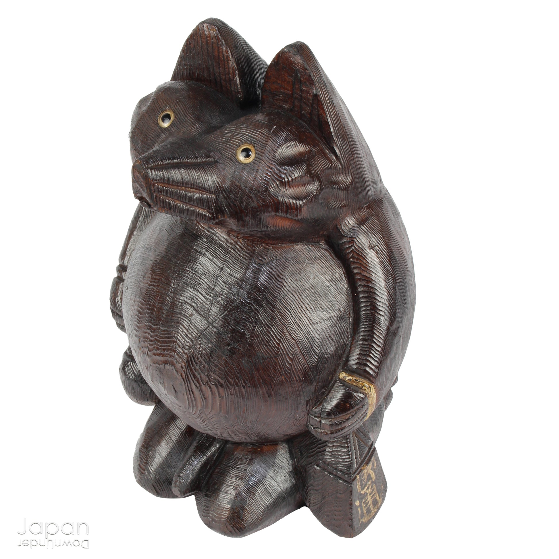 Bring home a delightful piece of traditional Japanese folk art with this exceptionally rare and impressively large antique wooden tanuki -  a beloved symbol of good luck, prosperity, and playful mischief in Japanese culture.