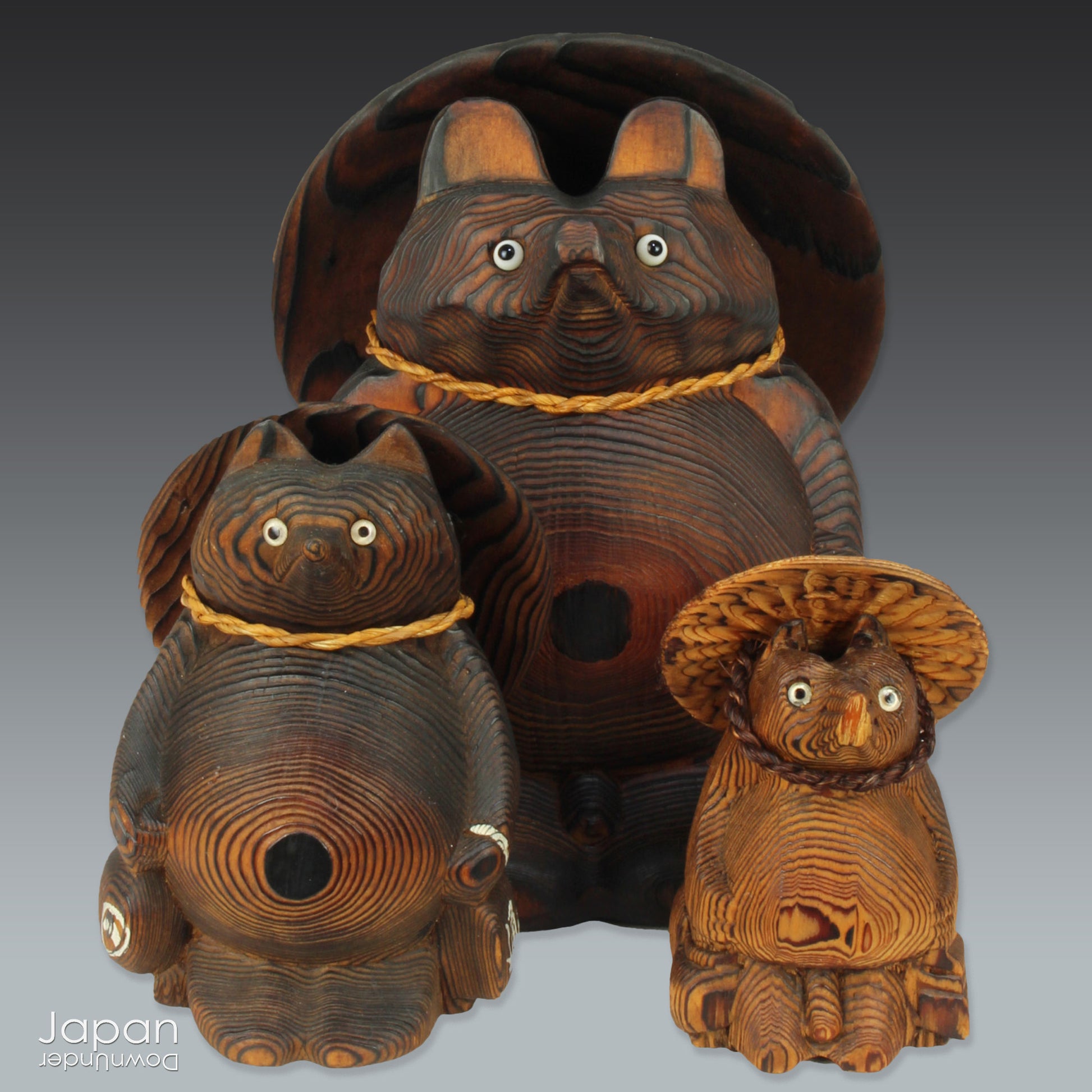 Add a dash of charm and cultural richness to your home with this delightful set of three antique Japanese tanuki wood carvings - authentic examples of traditional Japanese folk art, long believed to be bringers of good luck and prosperity.
