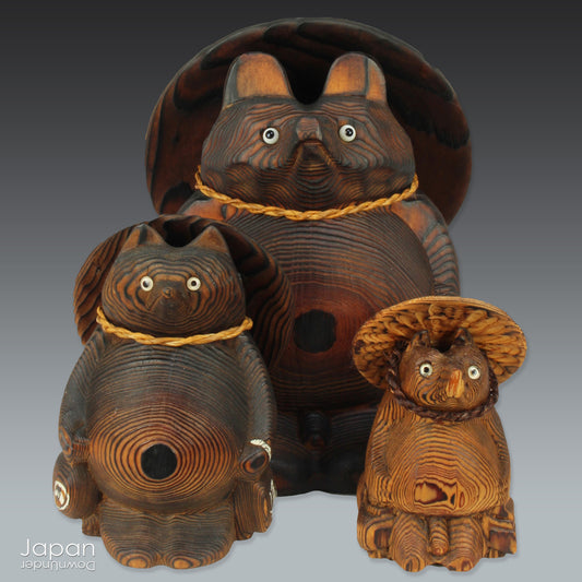 Add a dash of charm and cultural richness to your home with this delightful set of three antique Japanese tanuki wood carvings - authentic examples of traditional Japanese folk art, long believed to be bringers of good luck and prosperity.