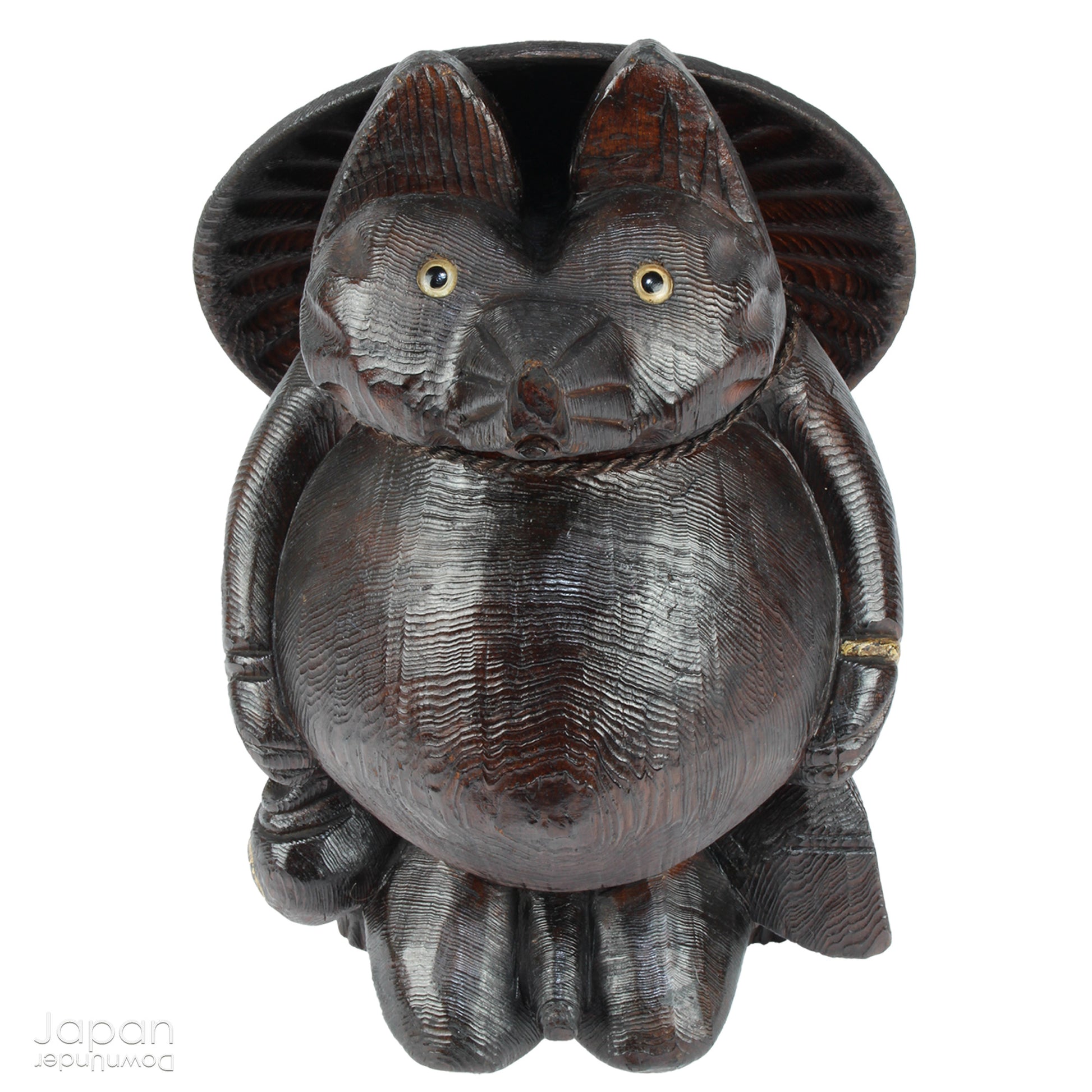 Bring home a delightful piece of traditional Japanese folk art with this exceptionally rare and impressively large antique wooden tanuki -  a beloved symbol of good luck, prosperity, and playful mischief in Japanese culture.