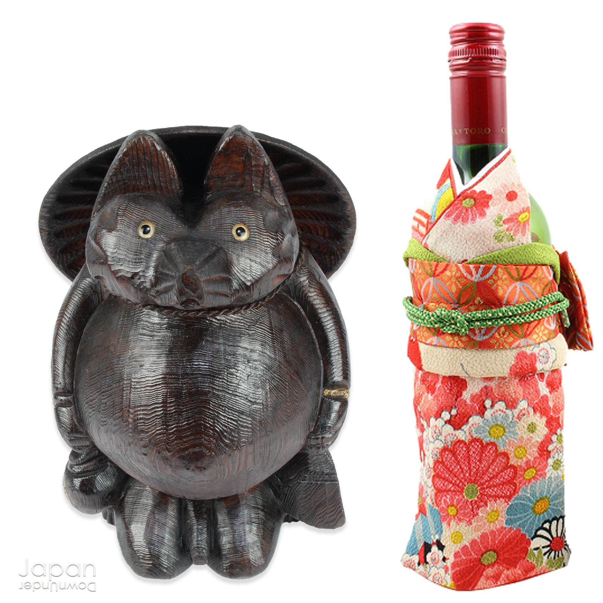 Bring home a delightful piece of traditional Japanese folk art with this exceptionally rare and impressively large antique wooden tanuki -  a beloved symbol of good luck, prosperity, and playful mischief in Japanese culture.