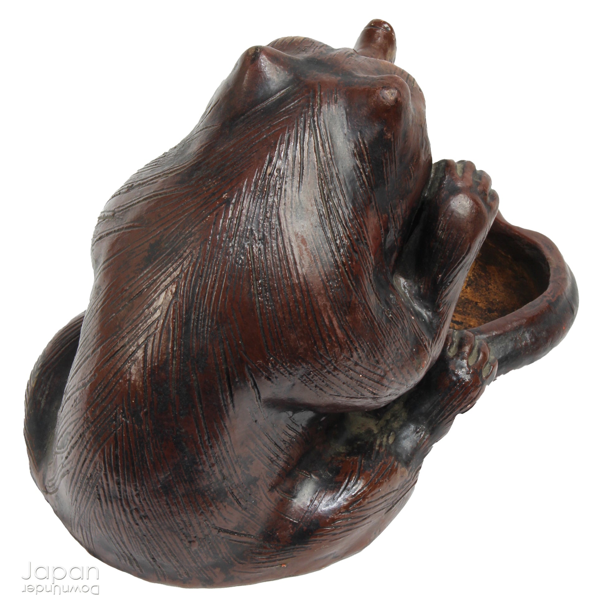 The tanuki has long been cherished in Japanese culture, evolving from a mischievous shapeshifter into a symbol of prosperity, good luck, and jovial mischief. Often associated with wealth and success in business, this playful figure is a familiar sight outside shops and homes - offering not just charm, but blessings too.