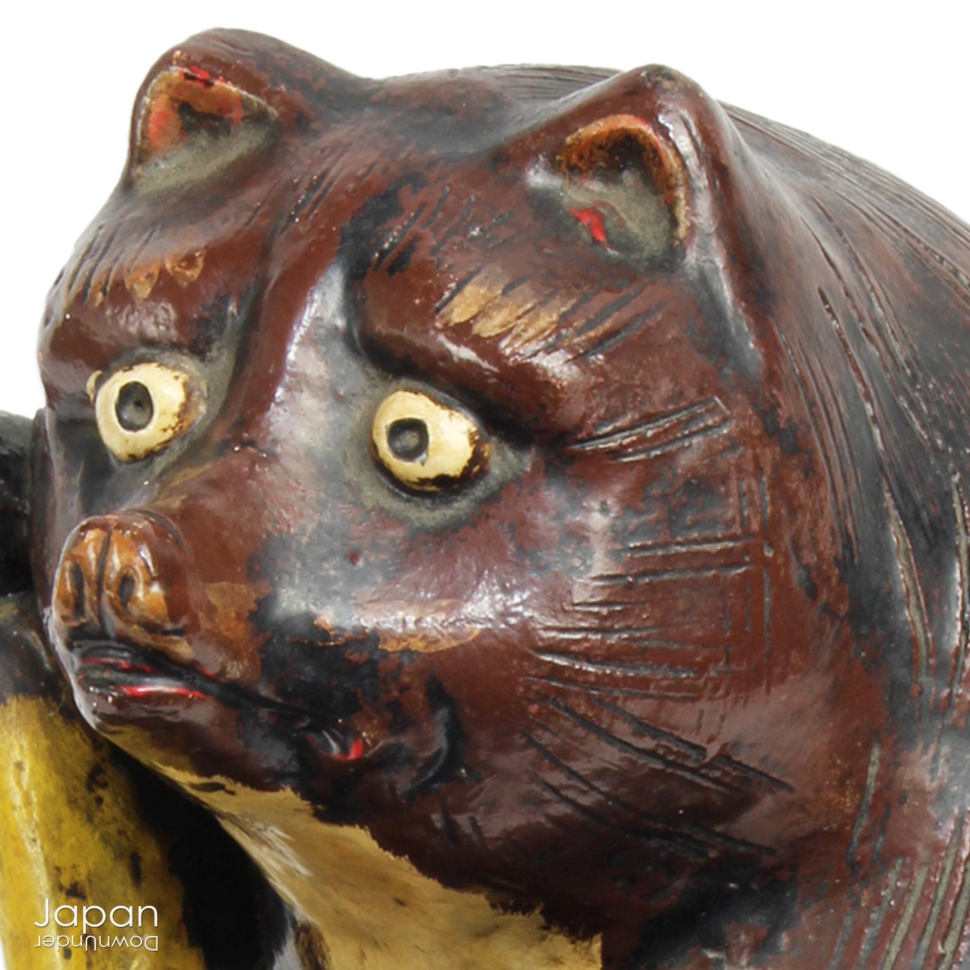 The tanuki has long been cherished in Japanese culture, evolving from a mischievous shapeshifter into a symbol of prosperity, good luck, and jovial mischief. Often associated with wealth and success in business, this playful figure is a familiar sight outside shops and homes - offering not just charm, but blessings too.