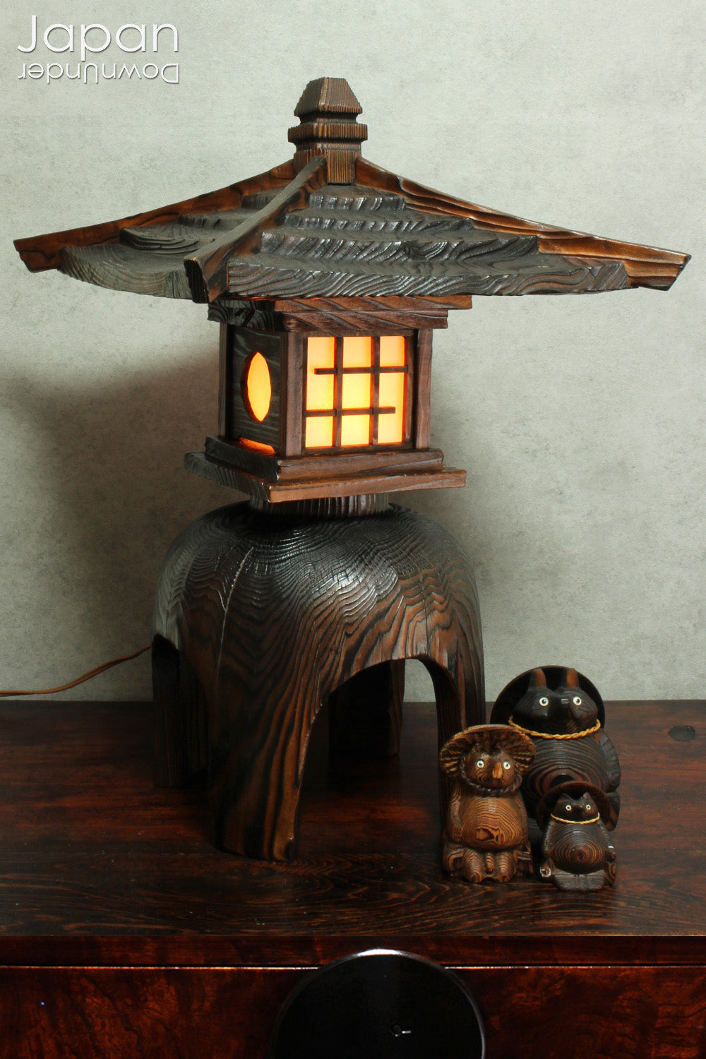 Add a dash of charm and cultural richness to your home with this delightful set of three antique Japanese tanuki wood carvings - authentic examples of traditional Japanese folk art, long believed to be bringers of good luck and prosperity.