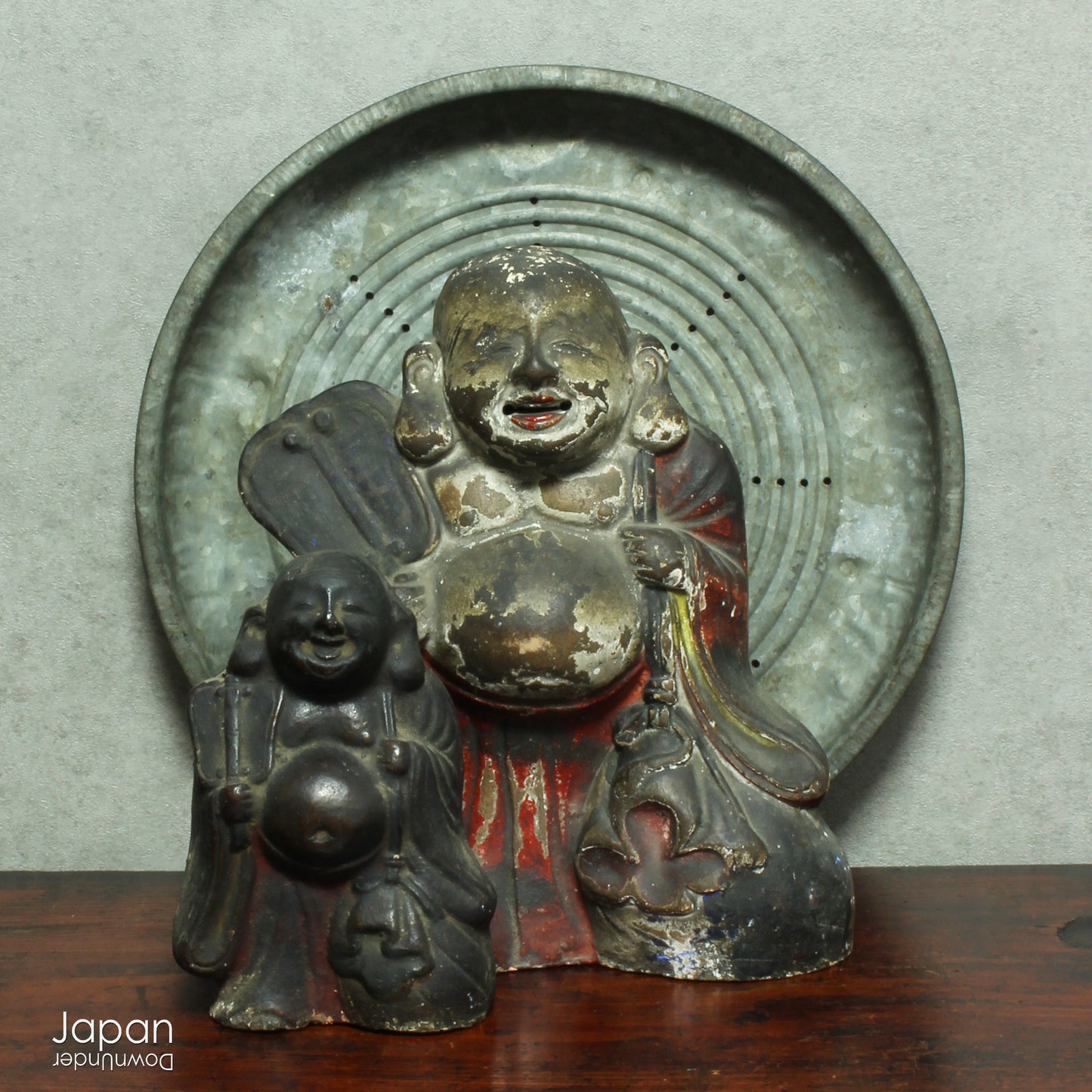 A wonderful piece of history, this charming 1800’s clay doll, shaped as Hotei, is the god of contentment and happiness and the guardian of children. This unique Shinto amulet is a rare find, adding a touch of whimsy and protection to your home.