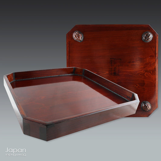 Infuse your space with refined charm through this glossy vintage Japanese lacquer tray - an exquisite fusion of traditional artistry and modern design. Poised gracefully on sculptural walnut shell legs, this distinctive piece is both functional and decorative, perfect for serving or showcasing your cherished treasures.