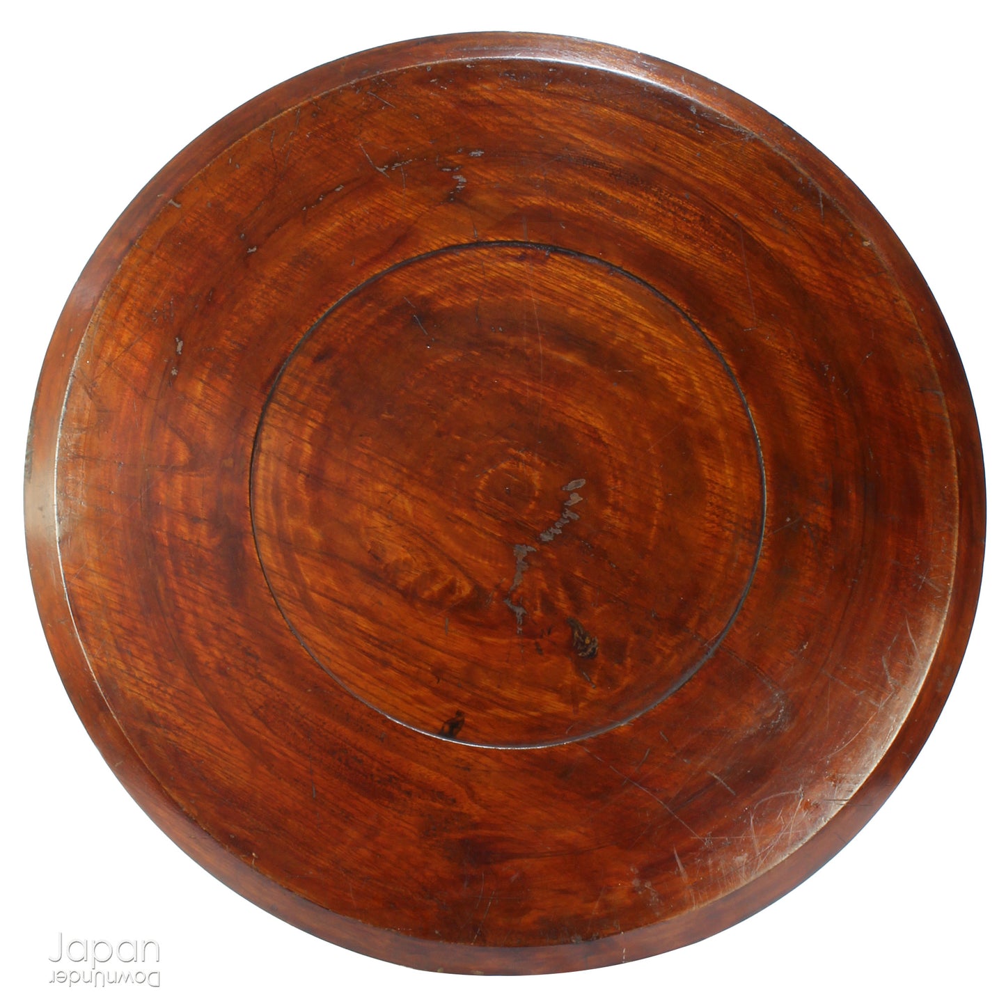 Add timeless charm and rustic elegance to your home with this exceptionally large antique round tea tray, hand-carved from a single cross-section of zelkova (keyaki) wood. A beautiful marriage of form and function, this piece serves equally well as a statement display stand, a unique tabletop, or a traditional tea-serving tray.