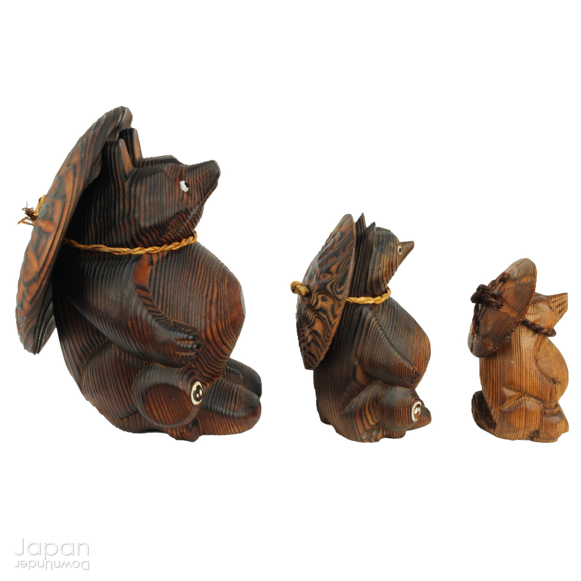 Add a dash of charm and cultural richness to your home with this delightful set of three antique Japanese tanuki wood carvings - authentic examples of traditional Japanese folk art, long believed to be bringers of good luck and prosperity.
