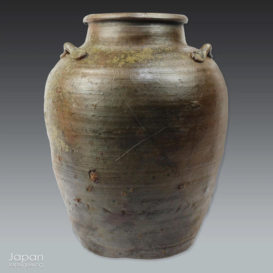 This handcrafted antique Bizen vase brings a serene, soulful presence to any interior. With its earthy tones and rustic textures, it offers more than simple decoration - it tells a story woven through centuries of Japanese heritage.