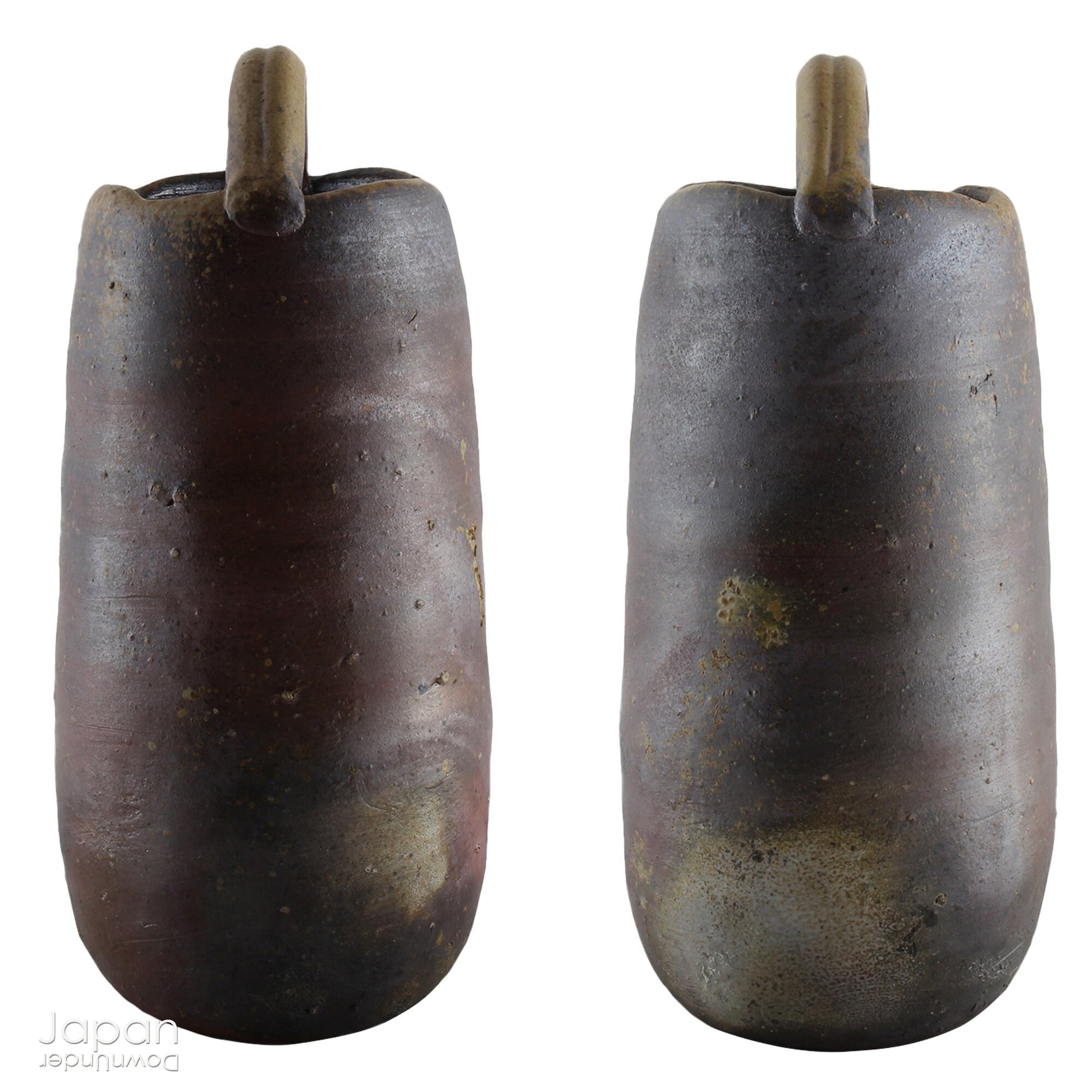 This hanaire - a flower vase used in the Japanese tea ceremony - is crafted in classic Bizen style, known for its unglazed, natural beauty. Bizen ware hails from one of Japan’s six ancient kilns and has been prized for its organic aesthetic and enduring strength since the medieval era.
