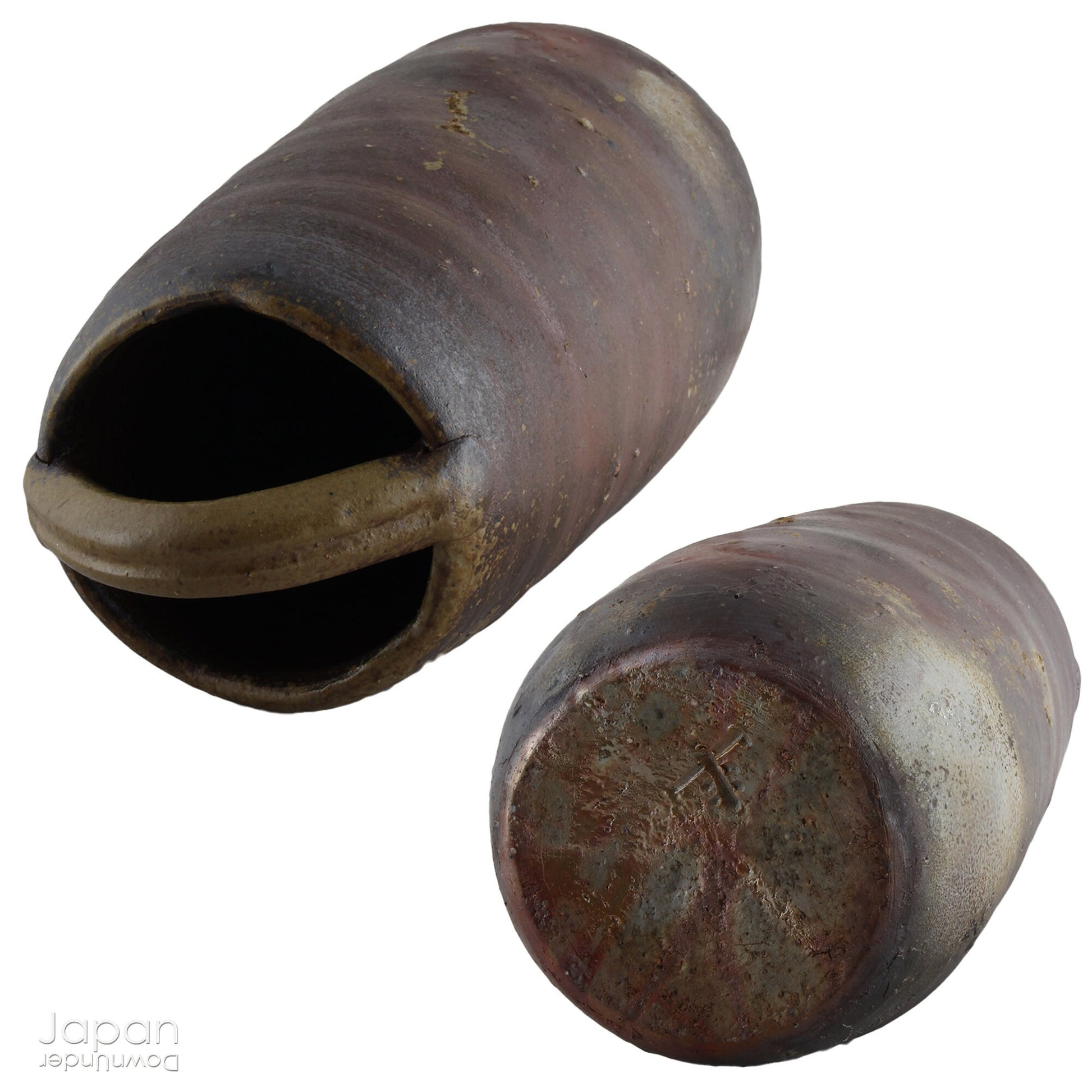 This hanaire - a flower vase used in the Japanese tea ceremony - is crafted in classic Bizen style, known for its unglazed, natural beauty. Bizen ware hails from one of Japan’s six ancient kilns and has been prized for its organic aesthetic and enduring strength since the medieval era.