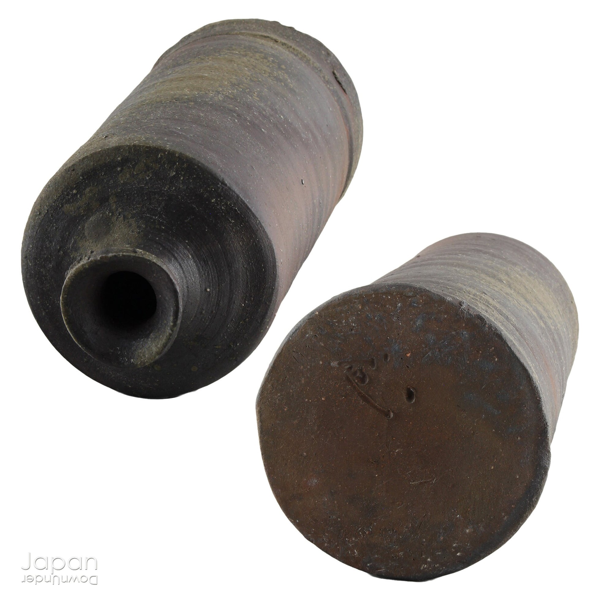 Handcrafted in classic Bizen style, this vase showcases the raw, unglazed clay and natural firing marks that make Bizen pottery so revered. Originating from one of Japan’s Six Ancient Kilns, Bizen ware has been treasured for its earthy textures, rich patina, and exceptional durability since the 12th century.