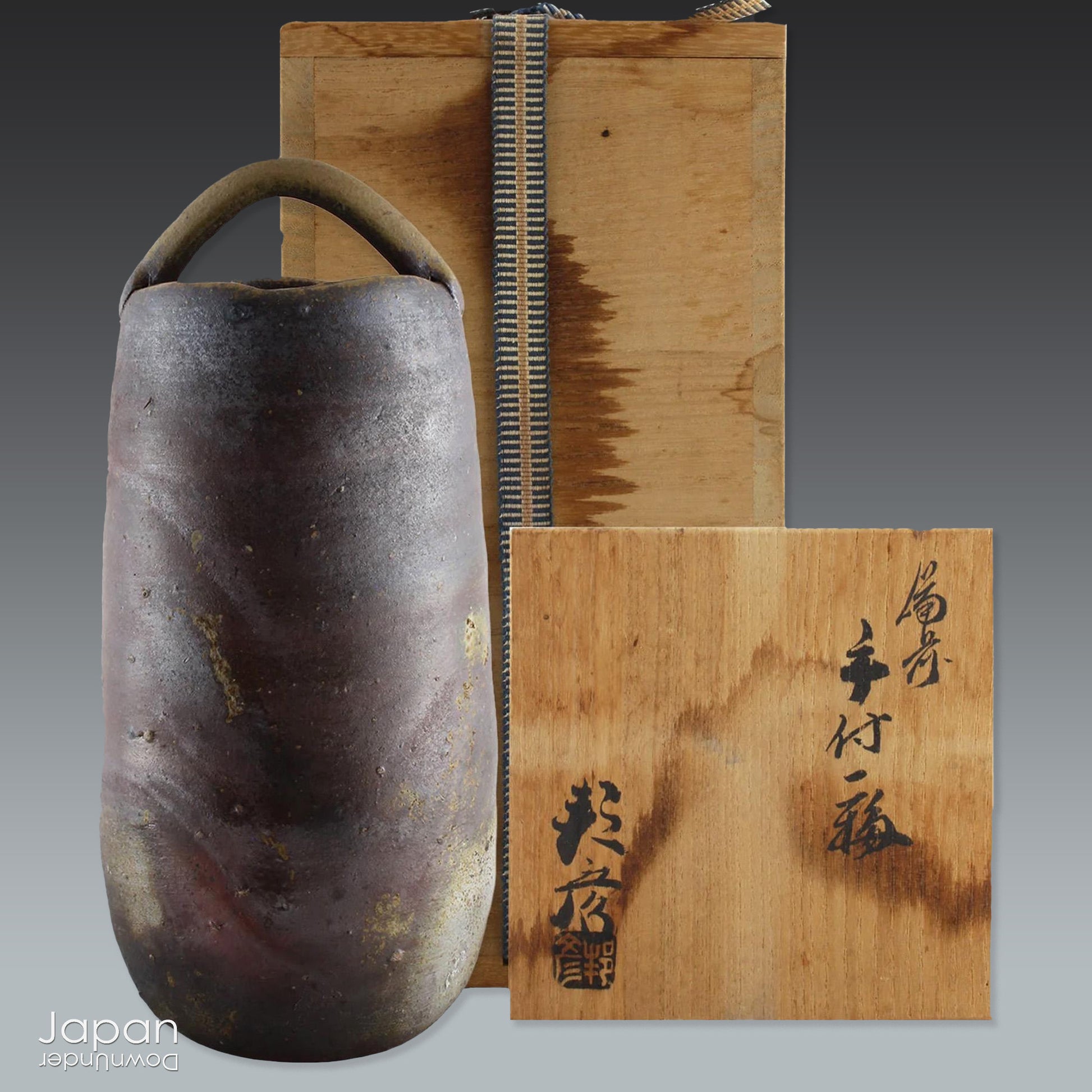 This hanaire - a flower vase used in the Japanese tea ceremony - is crafted in classic Bizen style, known for its unglazed, natural beauty. Bizen ware hails from one of Japan’s six ancient kilns and has been prized for its organic aesthetic and enduring strength since the medieval era.