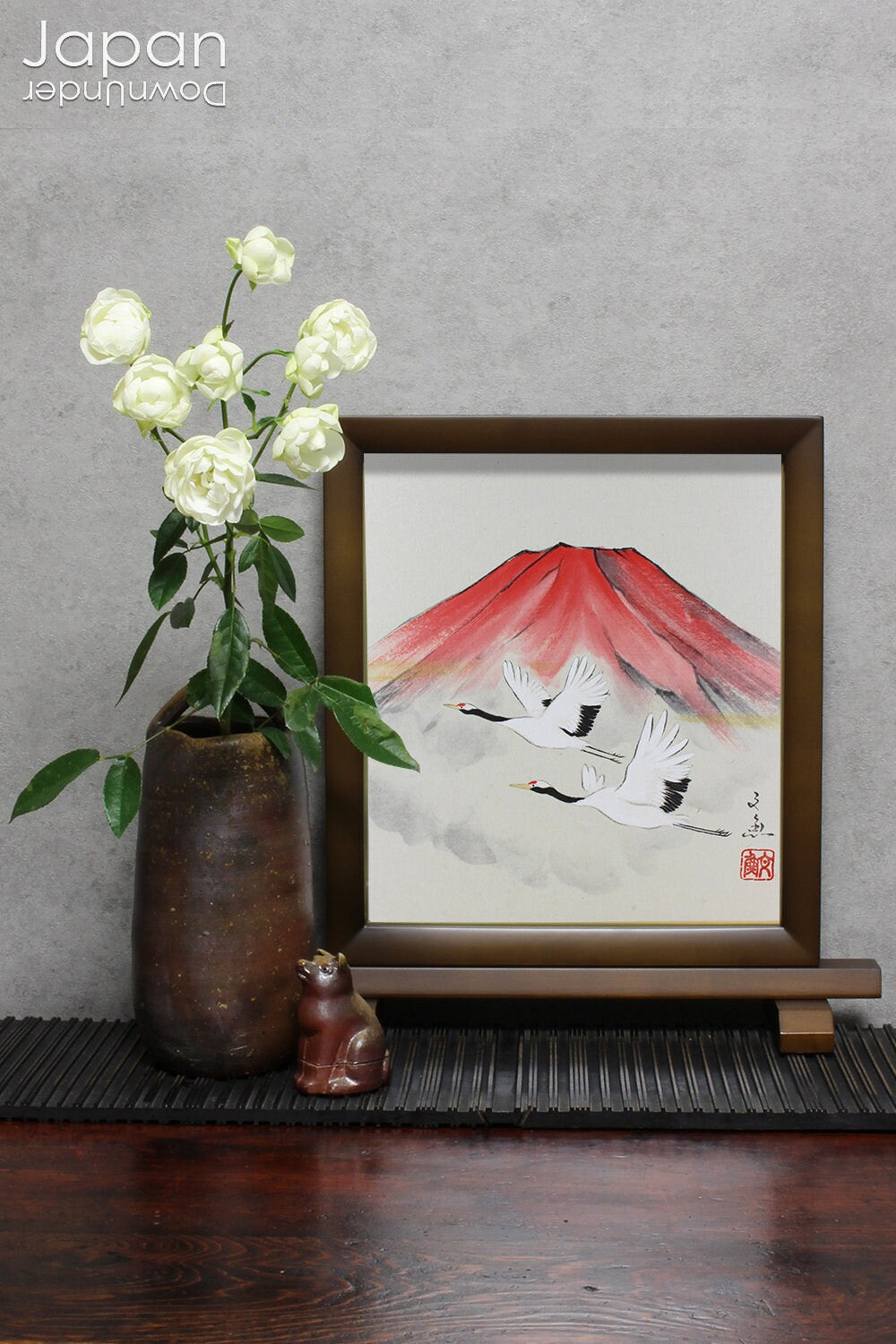 This hanaire - a flower vase used in the Japanese tea ceremony - is crafted in classic Bizen style, known for its unglazed, natural beauty. Bizen ware hails from one of Japan’s six ancient kilns and has been prized for its organic aesthetic and enduring strength since the medieval era.