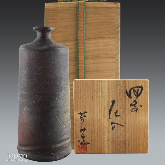 Handcrafted in classic Bizen style, this vase showcases the raw, unglazed clay and natural firing marks that make Bizen pottery so revered. Originating from one of Japan’s Six Ancient Kilns, Bizen ware has been treasured for its earthy textures, rich patina, and exceptional durability since the 12th century.