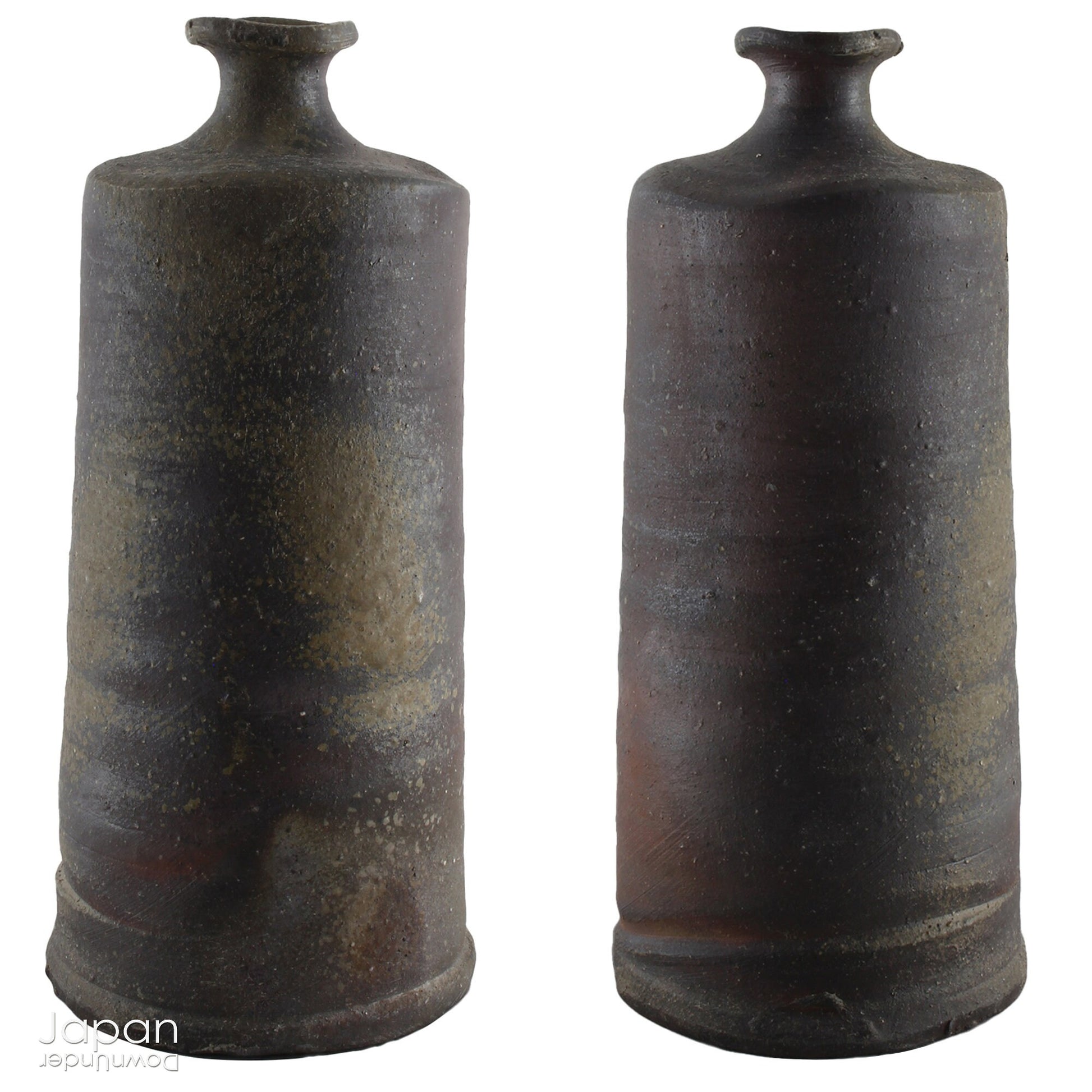 Handcrafted in classic Bizen style, this vase showcases the raw, unglazed clay and natural firing marks that make Bizen pottery so revered. Originating from one of Japan’s Six Ancient Kilns, Bizen ware has been treasured for its earthy textures, rich patina, and exceptional durability since the 12th century.