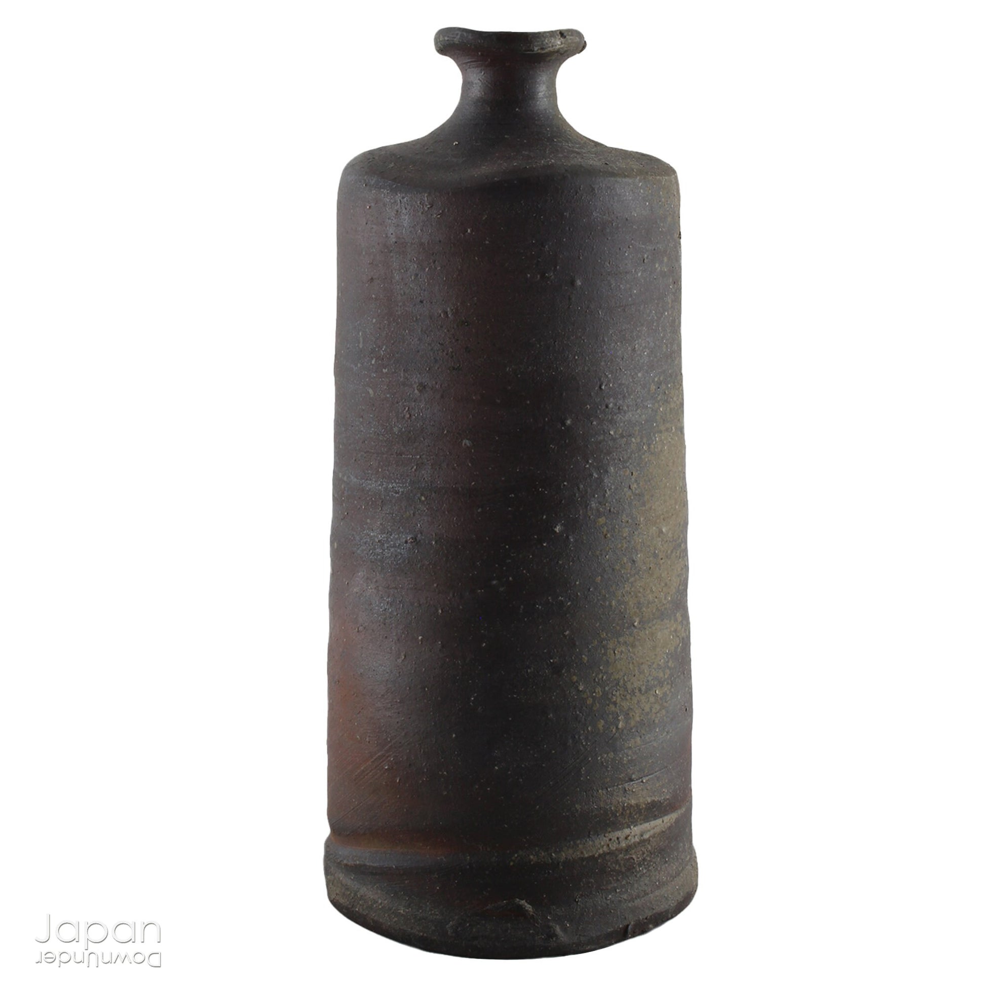 Handcrafted in classic Bizen style, this vase showcases the raw, unglazed clay and natural firing marks that make Bizen pottery so revered. Originating from one of Japan’s Six Ancient Kilns, Bizen ware has been treasured for its earthy textures, rich patina, and exceptional durability since the 12th century.