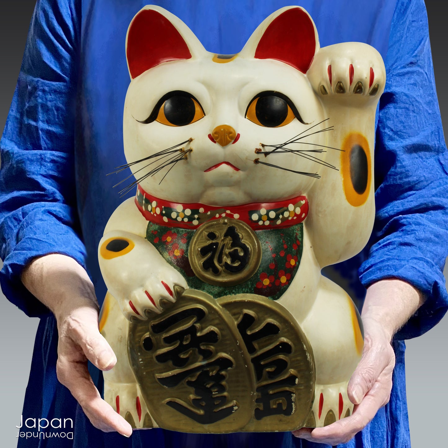 Invite good fortune and wealth into your home or business with this stunning, oversized white Maneki Neko, the iconic Japanese "lucky cat." With a rich history steeped in tradition, this unique piece isn’t just a collector’s item -it’s a symbol of prosperity, positive energy, and timeless charm.