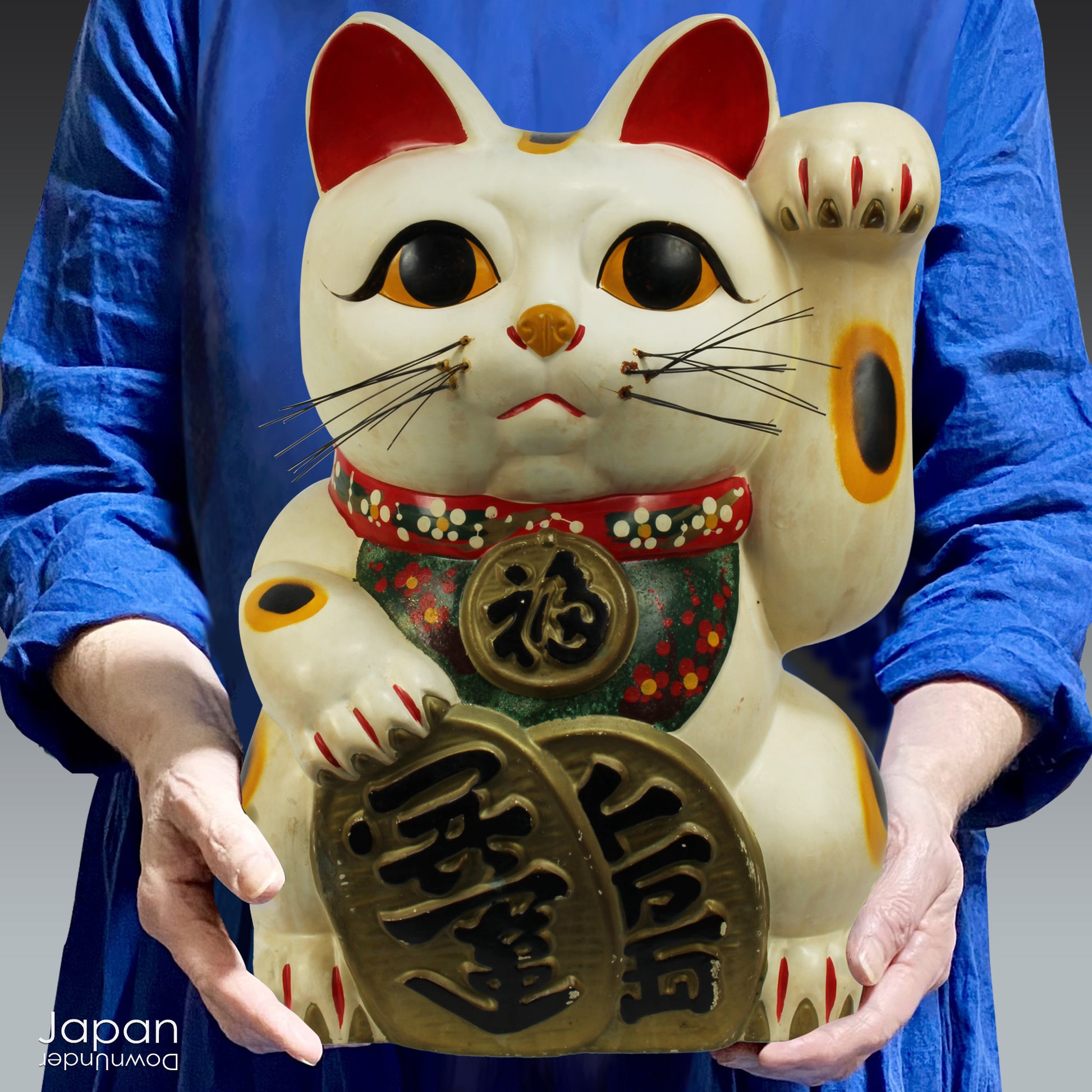 Invite good fortune and wealth into your home or business with this stunning, oversized white Maneki Neko, the iconic Japanese "lucky cat." With a rich history steeped in tradition, this unique piece isn’t just a collector’s item -it’s a symbol of prosperity, positive energy, and timeless charm.