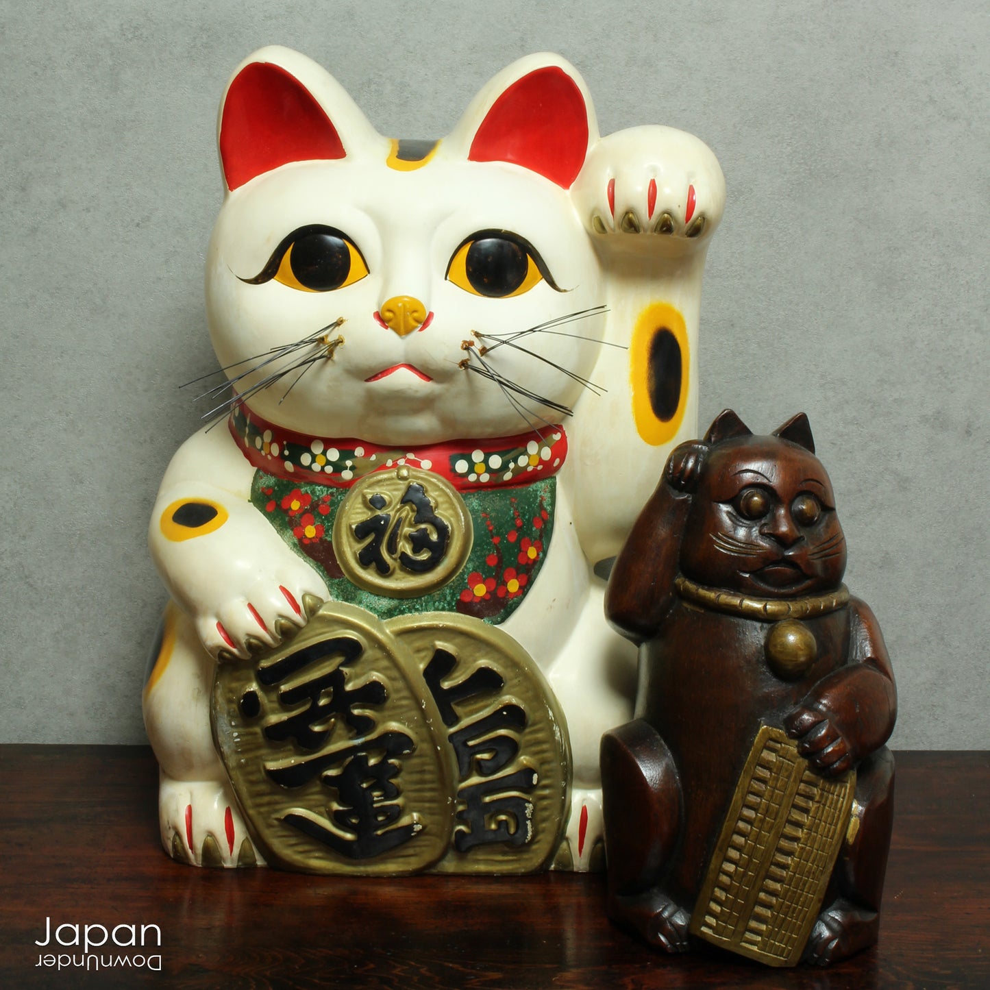 Invite good fortune and wealth into your home or business with this stunning, oversized white Maneki Neko, the iconic Japanese "lucky cat." With a rich history steeped in tradition, this unique piece isn’t just a collector’s item -it’s a symbol of prosperity, positive energy, and timeless charm.