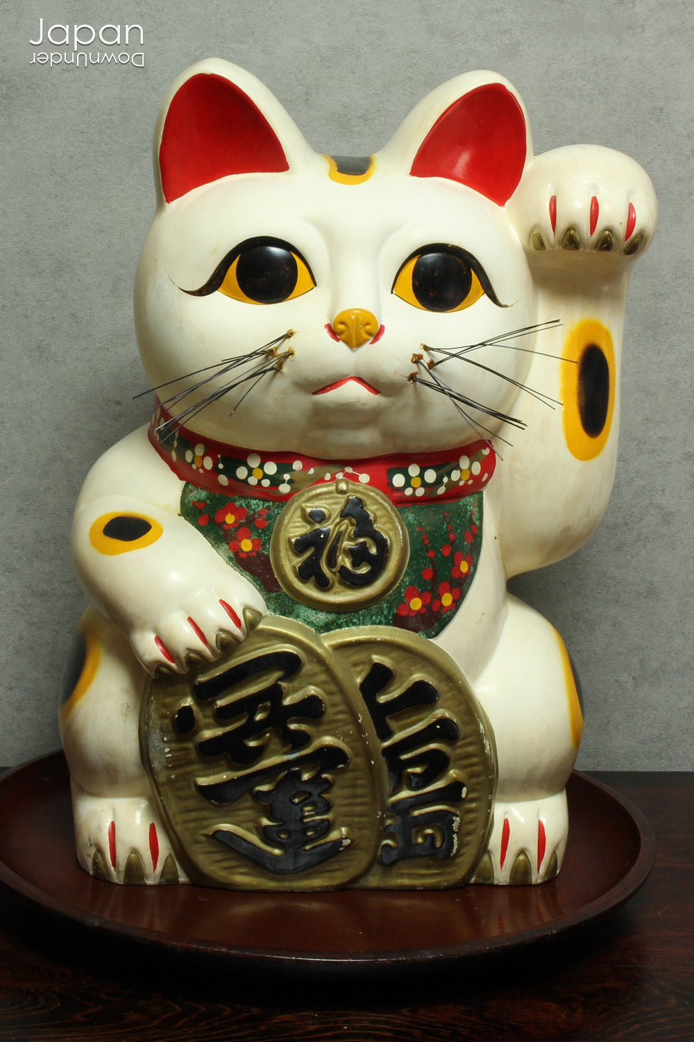 Invite good fortune and wealth into your home or business with this stunning, oversized white Maneki Neko, the iconic Japanese "lucky cat." With a rich history steeped in tradition, this unique piece isn’t just a collector’s item -it’s a symbol of prosperity, positive energy, and timeless charm.