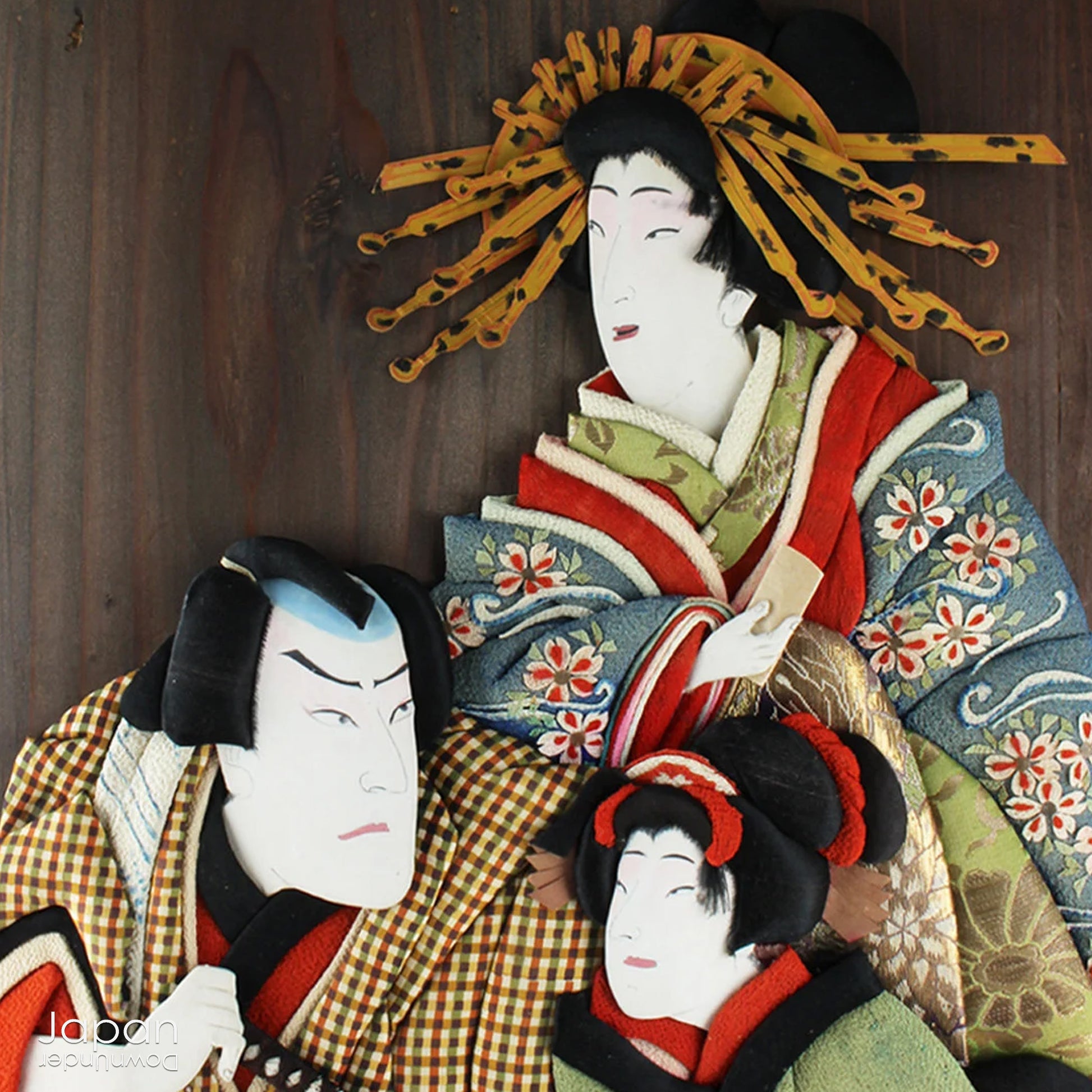 Infuse your home with the rich history and exquisite craftsmanship of this framed antique traditional Japanese Oshie fabric art. Featuring intricate, three-dimensional depictions of Kabuki players, this piece is a true masterpiece that will captivate and become a striking focal point in any room.
