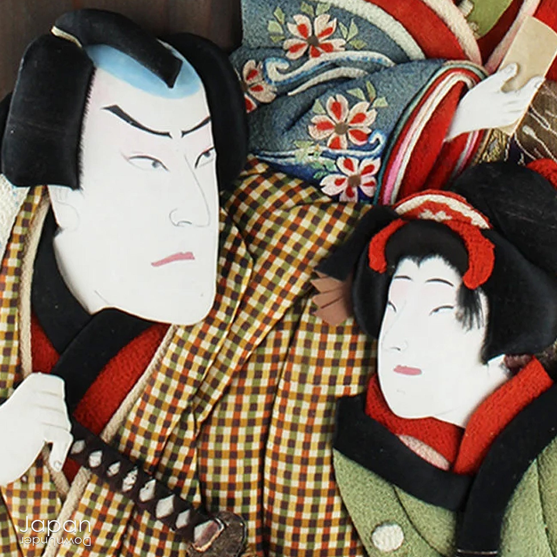 Infuse your home with the rich history and exquisite craftsmanship of this framed antique traditional Japanese Oshie fabric art. Featuring intricate, three-dimensional depictions of Kabuki players, this piece is a true masterpiece that will captivate and become a striking focal point in any room.