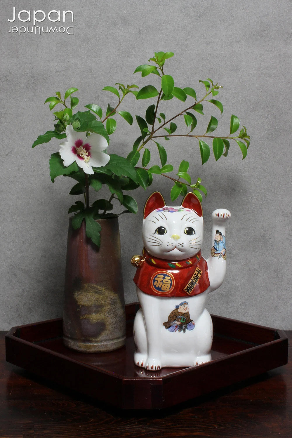 Infuse your space with refined charm through this glossy vintage Japanese lacquer tray - an exquisite fusion of traditional artistry and modern design. Poised gracefully on sculptural walnut shell legs, this distinctive piece is both functional and decorative, perfect for serving or showcasing your cherished treasures.