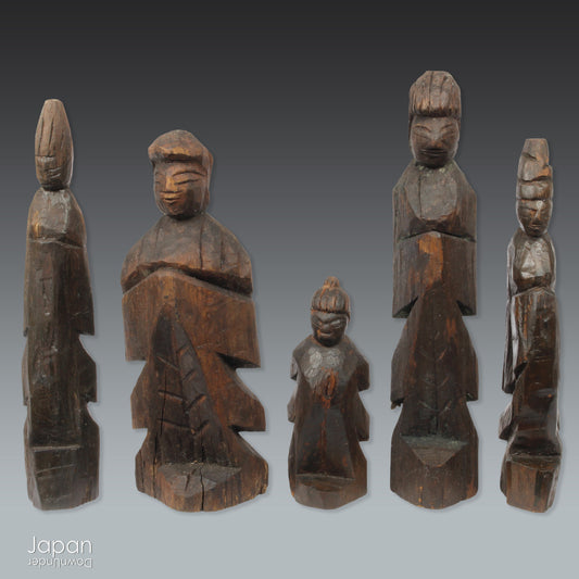 A collection of old hand-carved Enku-style Buddha and Kannon statues.  Enku was a Buddhist monk, much loved for his simple, folk art statues, carved during his many pilgrimages  to the mountains.  These old carvings are made of a light wood.