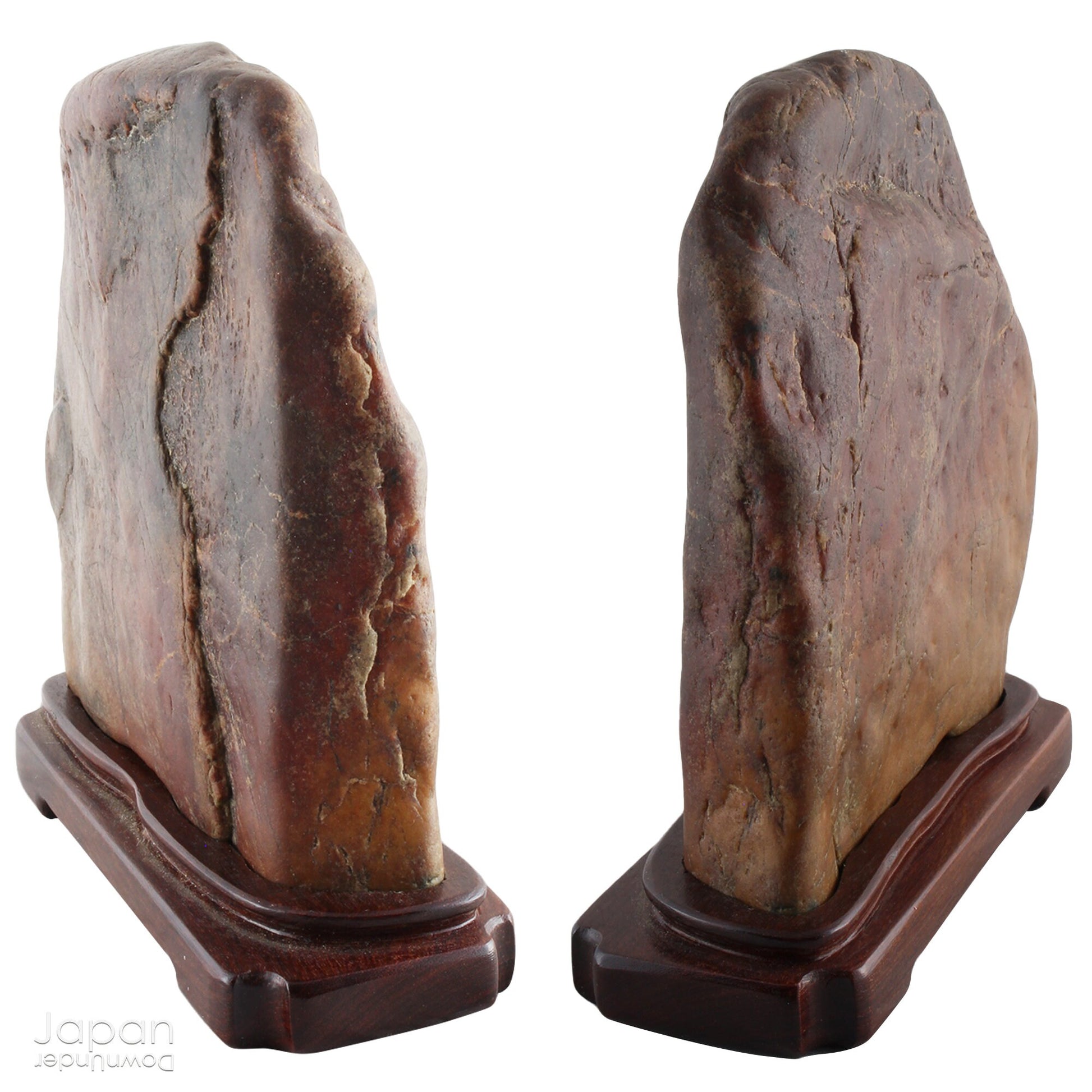 Traditional Japanese stones are classified into a variety of subject categories. There are rugged mountain ranges, mountain peaks from near and afar, snow capped mountains, mountains with waterfalls and lakes, mountain plateaus, coastal rocks with tunnels, human shapes, animal shapes, hut shapes and stones with pictures, to name a few.