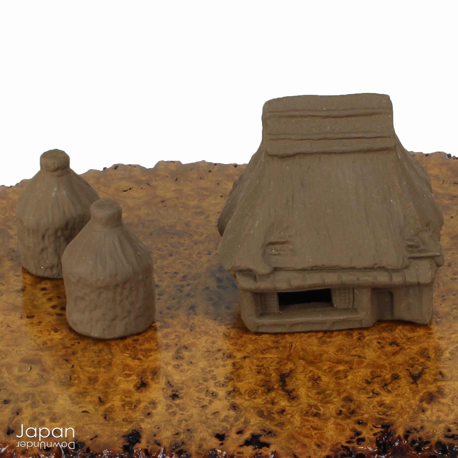 Bring your bonsai and suiseki presentations to life with this charming collection of vintage Japanese ceramic miniatures. Known as tenkei or tenpai, these small accessory pieces are traditionally used to create scale, evoke atmosphere, and infuse scenes with storytelling and imagination.