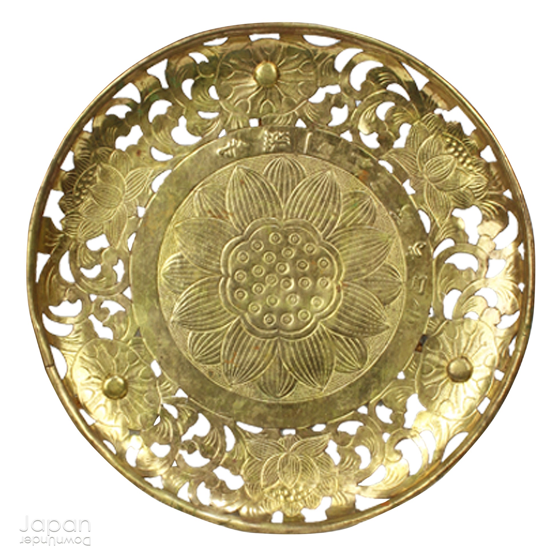 Infuse your home with beauty, spirituality, and history with this Japanese antique Buddhist brass flower plate. Traditionally used in Buddhist ceremonies, this stunning piece represents purification and protection. Whether displayed in your home or meditation space, this unique and meaningful item adds a touch of sacred elegance to any setting.
