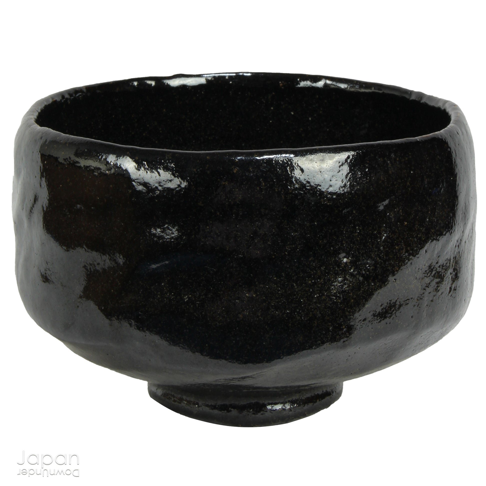 Elevate your tea experience with this stunning vintage black raku ware matcha tea bowl, a timeless work of art that brings both beauty and sophistication to every sip. Handcrafted in Kyoto, Japan, this elegant bowl features a striking contrast between the glossy black glaze and subtle reddish-brown accents that emerge randomly across the surface - each one a testament to the artistry and uniqueness of the raku firing process.