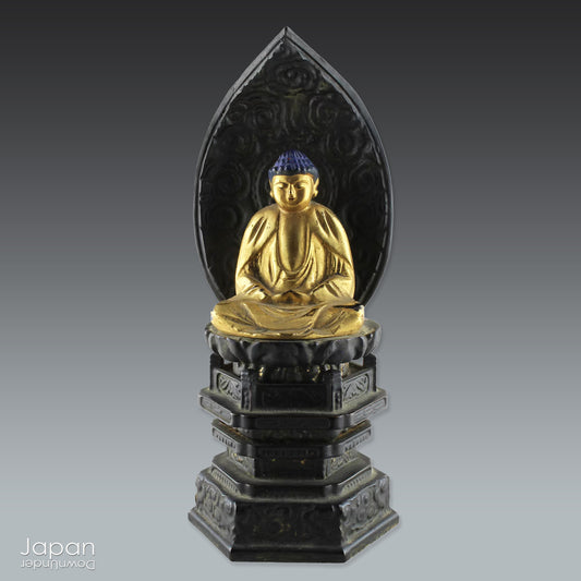 Transform your living space with the timeless elegance of this vintage Amida Nyorai statue, adorned with intricate gold gilt and striking black lacquer accents. A true testament to Japanese artistry, this handcrafted statue reflects the serene beauty and spiritual significance of one of Buddhism’s most cherished figures. 