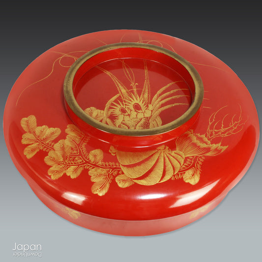 A refined and exquisite example of Meiji-era artistry, this red lacquer lidded sweet bowl - known as an ohira - dates to 1894 (the 27th year of Meiji, Year of the Horse). Perfect as a statement piece or storage for small precious items, it embodies sophistication and charm, bringing a touch of traditional artistry and timeless elegance to your home. 