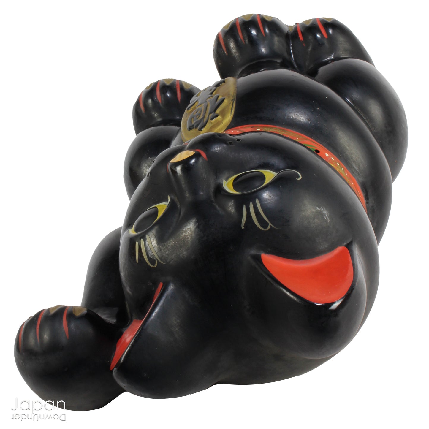 Welcome prosperity and good fortune into your space with this impressive oversized black antique Japanese lucky cat. Its charm is undeniable, from the adorable face to the beckoning paw, symbolizing wealth and good luck. A unique addition to your decor,  the maneki neko cat will certainly bring a smile to your face. Perfect for cat lovers and anyone seeking a touch of luck in their lives.