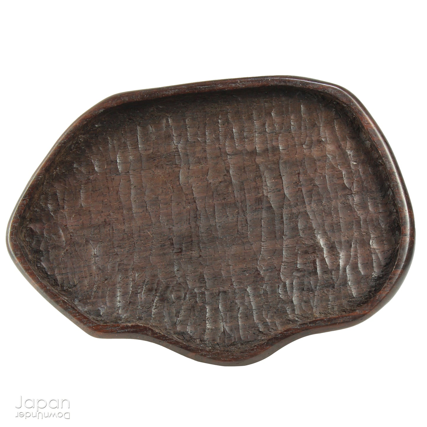 Immerse yourself in the meditative beauty of this captivating miniature suiseki - a traditional Japanese art form where nature is the true sculptor. Gracefully resting on a finely hand-carved ebony daiza (base), this stone embodies stillness and quiet strength, making it an ideal centerpiece for contemplative spaces, creative corners, or serene interiors.