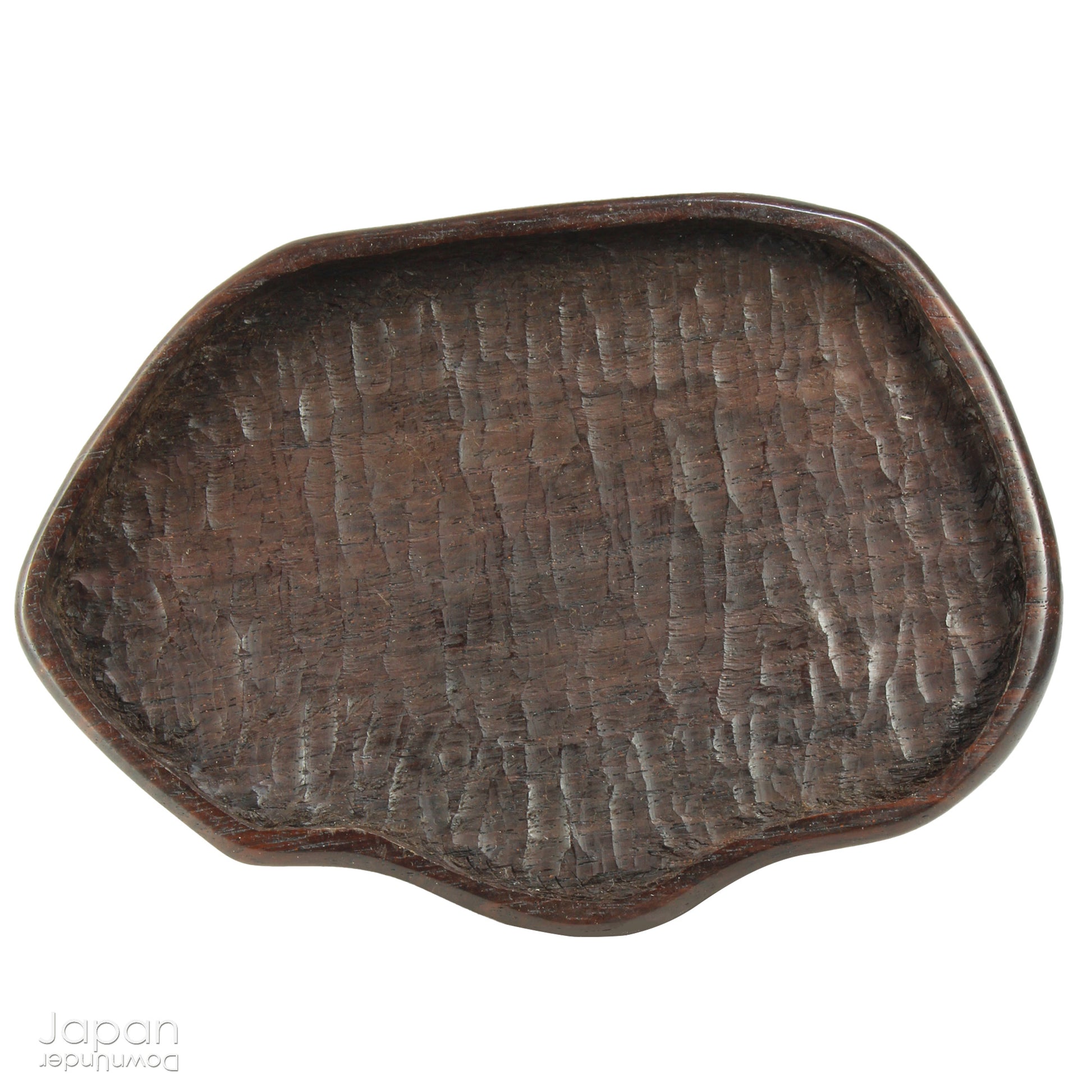 Immerse yourself in the meditative beauty of this captivating miniature suiseki - a traditional Japanese art form where nature is the true sculptor. Gracefully resting on a finely hand-carved ebony daiza (base), this stone embodies stillness and quiet strength, making it an ideal centerpiece for contemplative spaces, creative corners, or serene interiors.